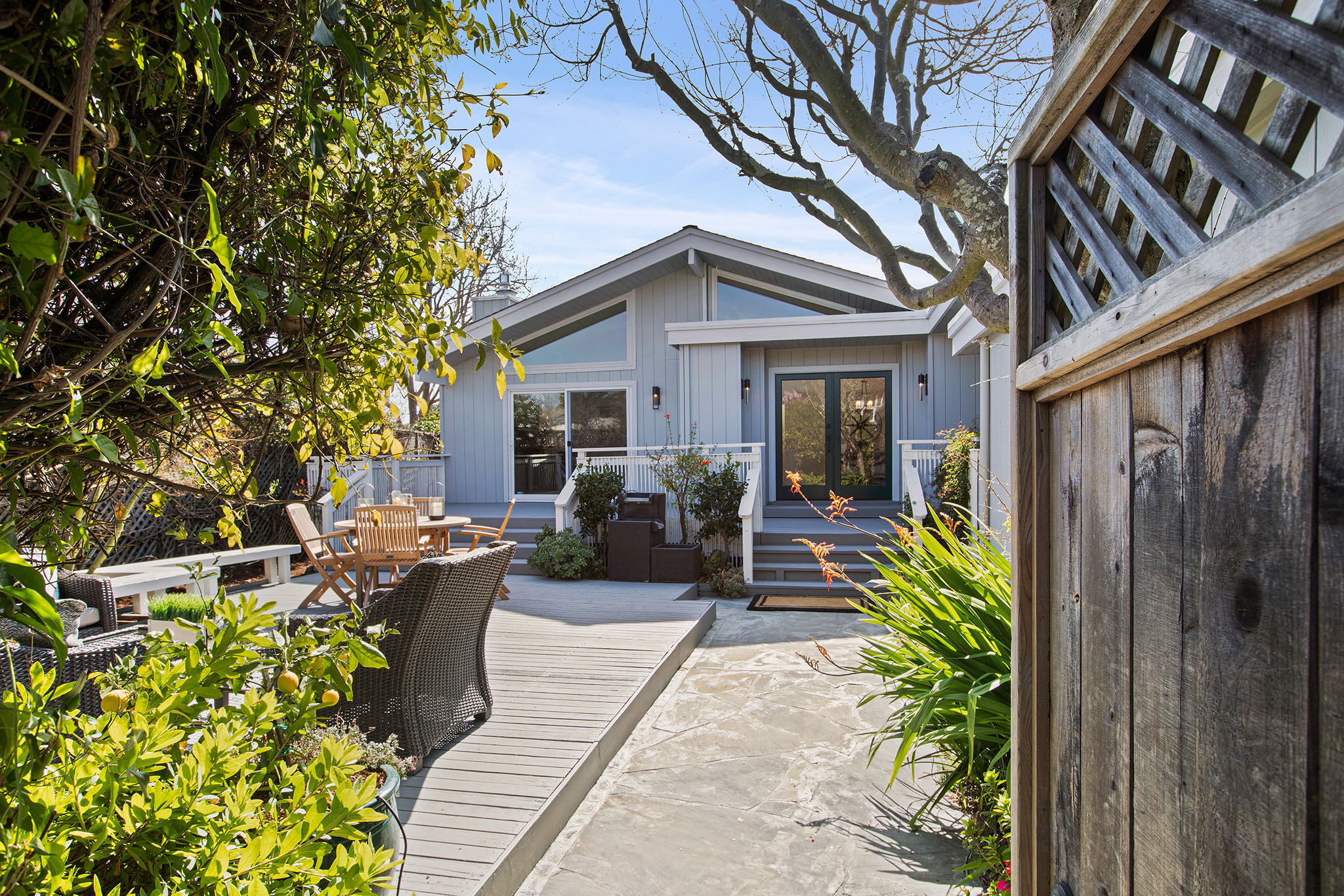 a house view with a seating space and garden view