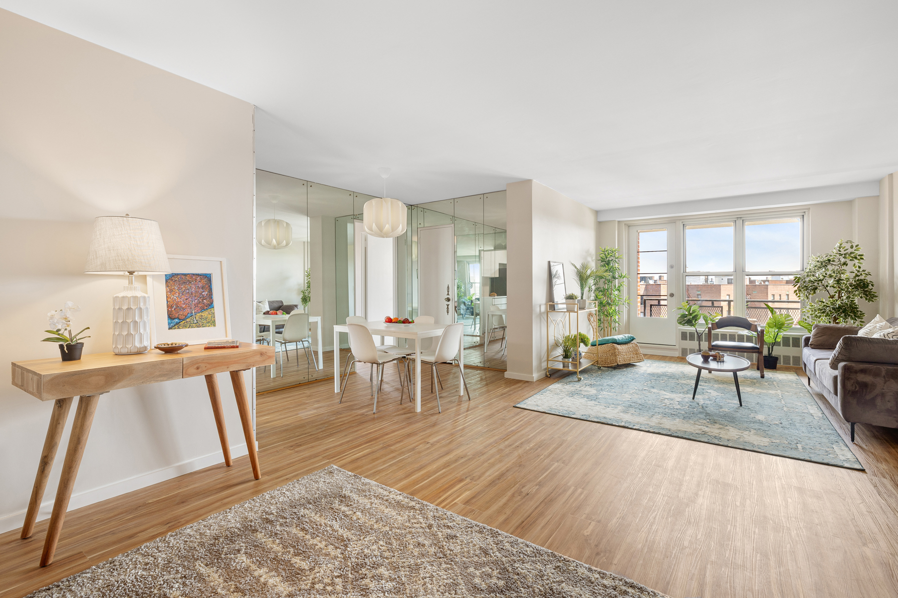 a living room with furniture and a table