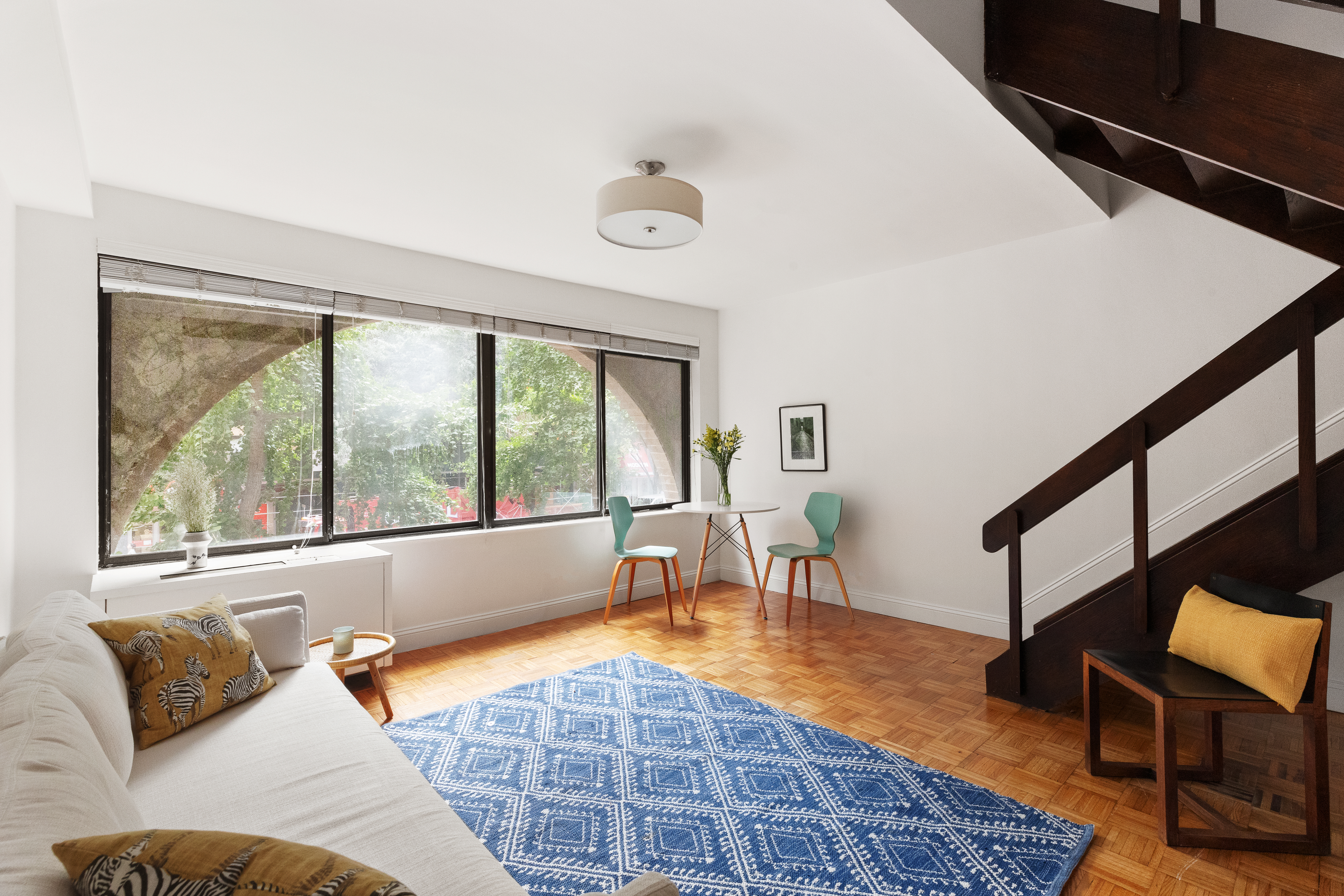 a living room with furniture and a table