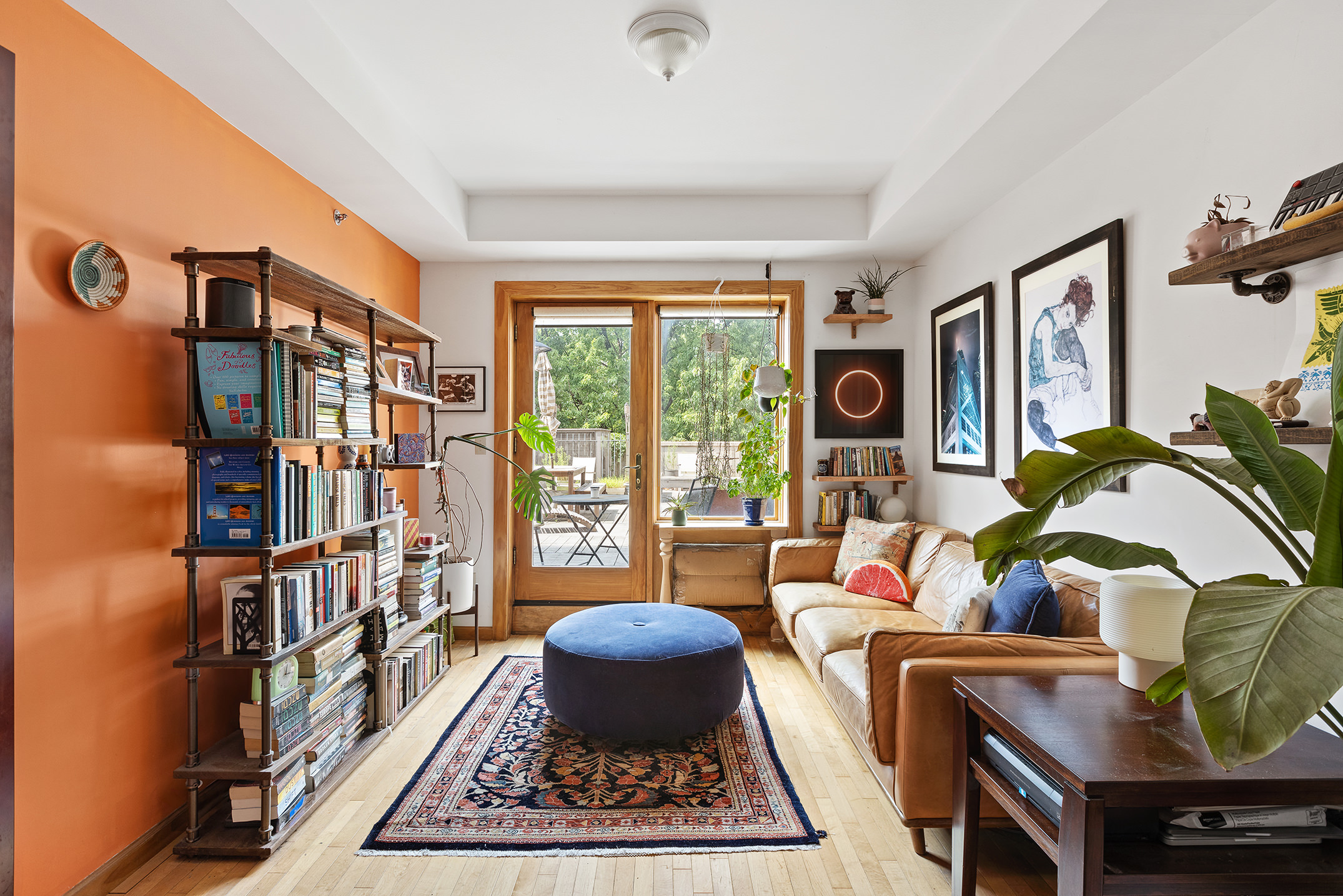 a living room with furniture and a rug