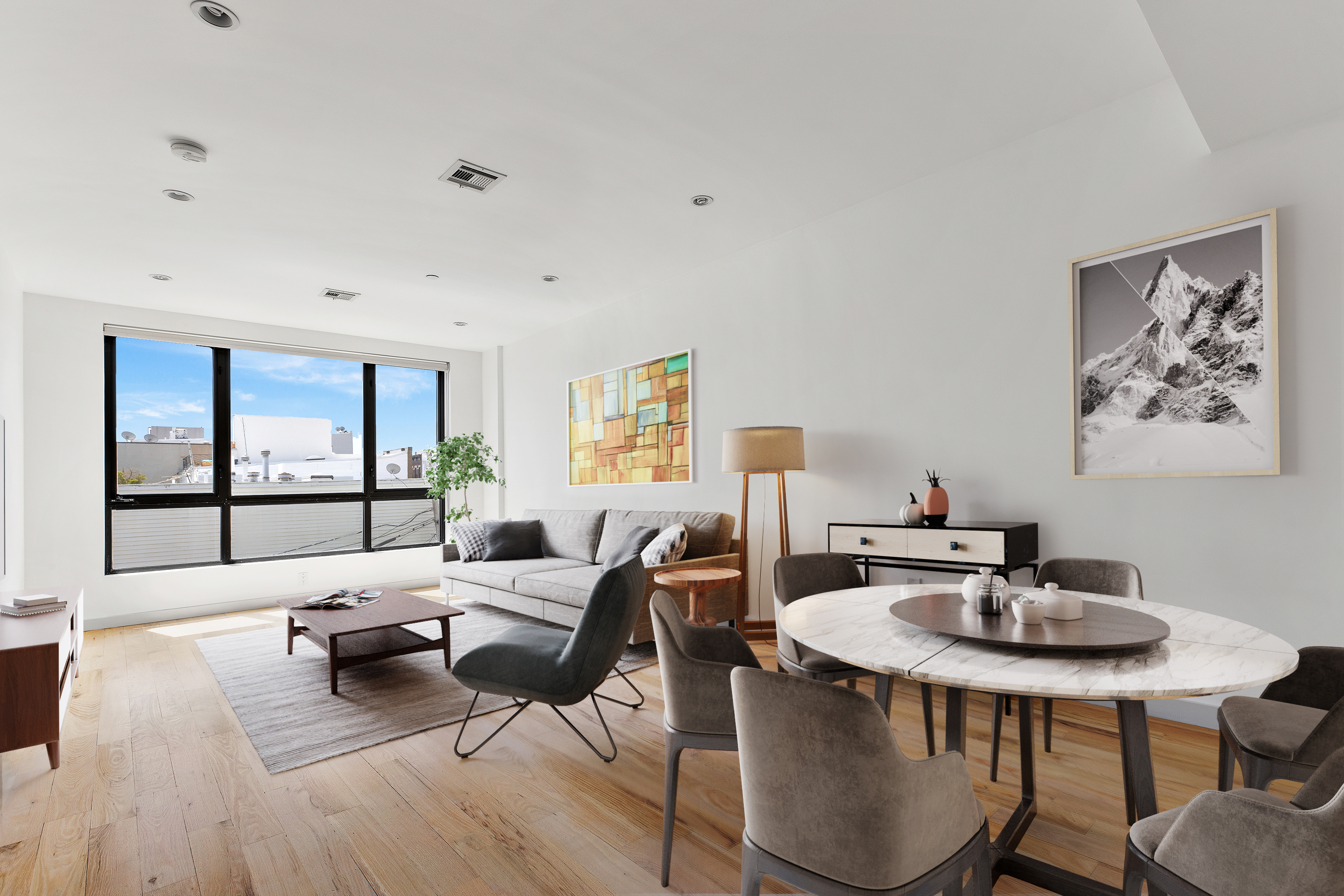 a living room with furniture and a table