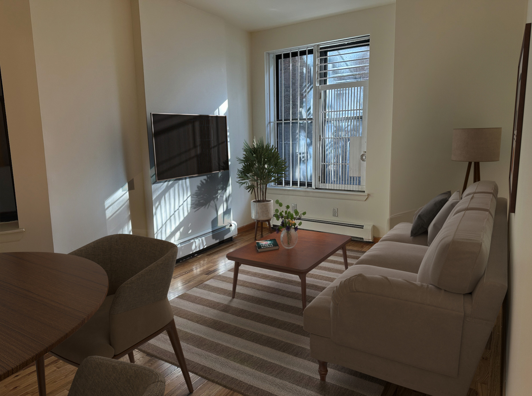 a living room with furniture and a flat screen tv