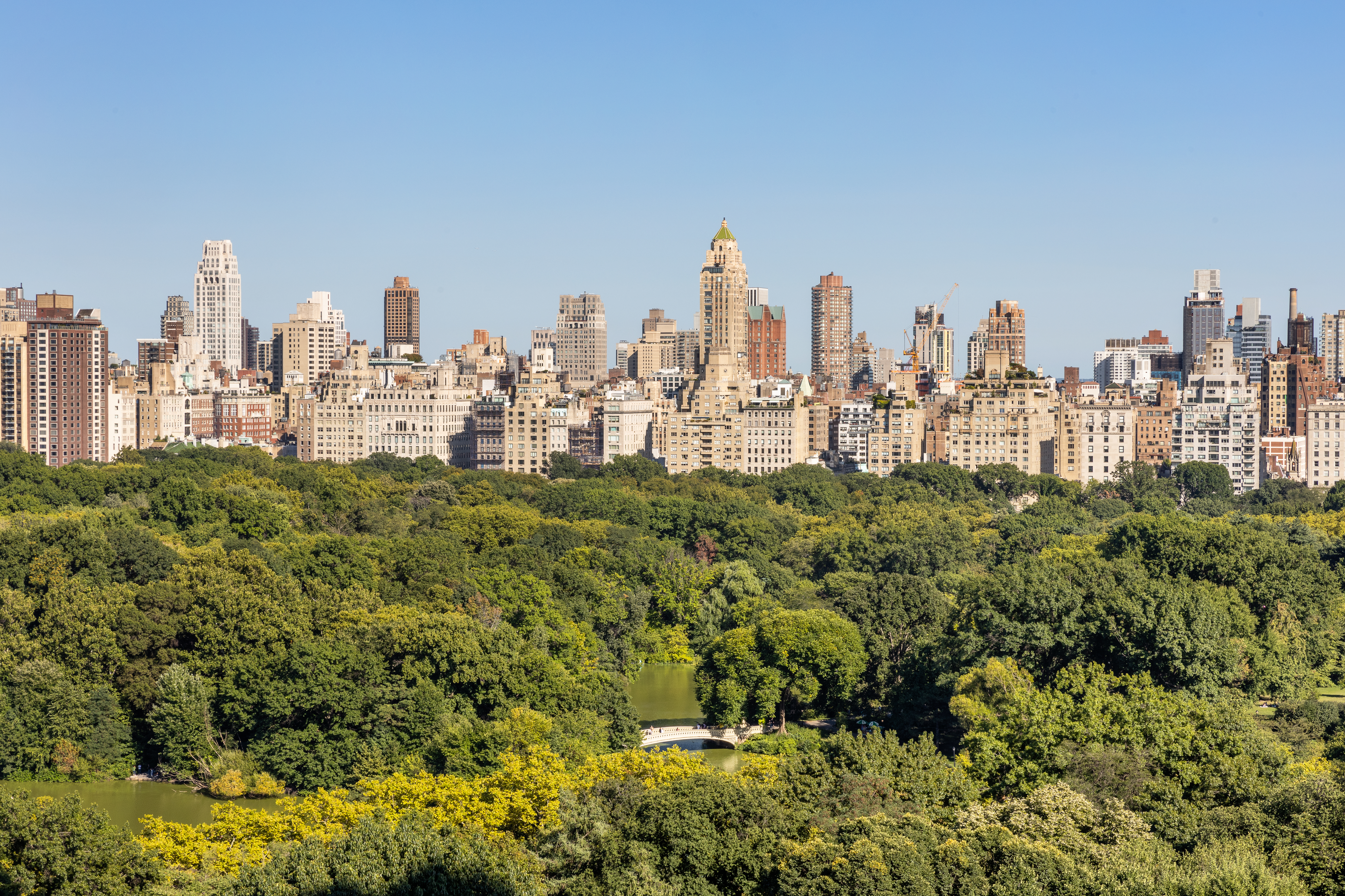 a view of a city with tall buildings