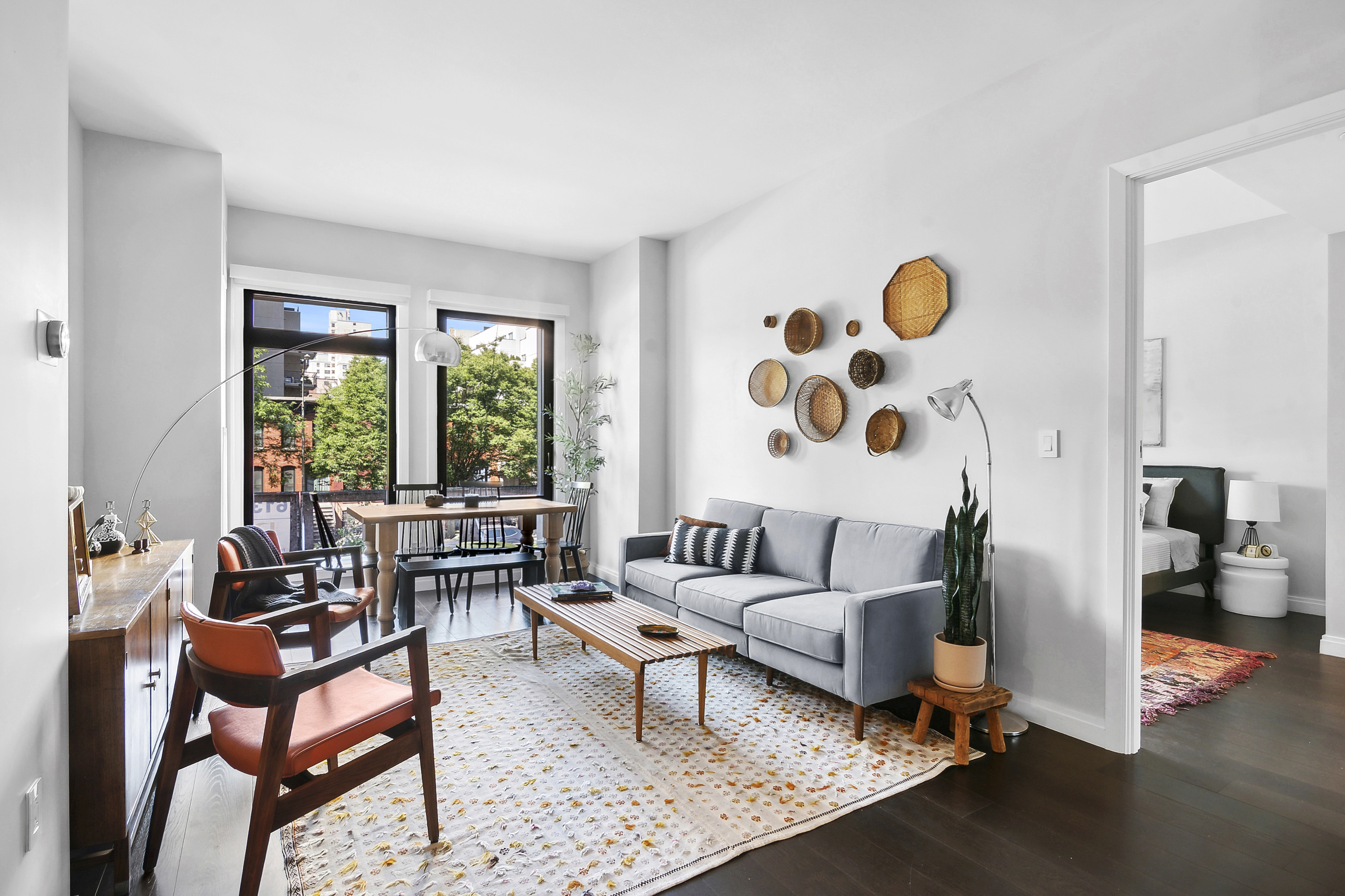 a living room with furniture and a window