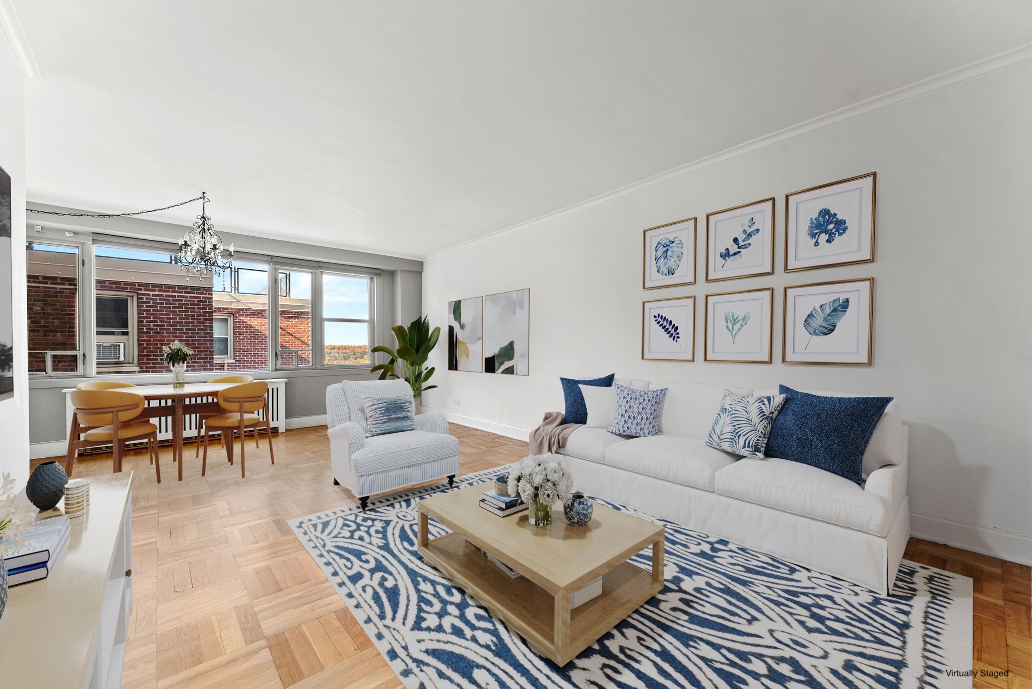 a living room with furniture a rug and a table