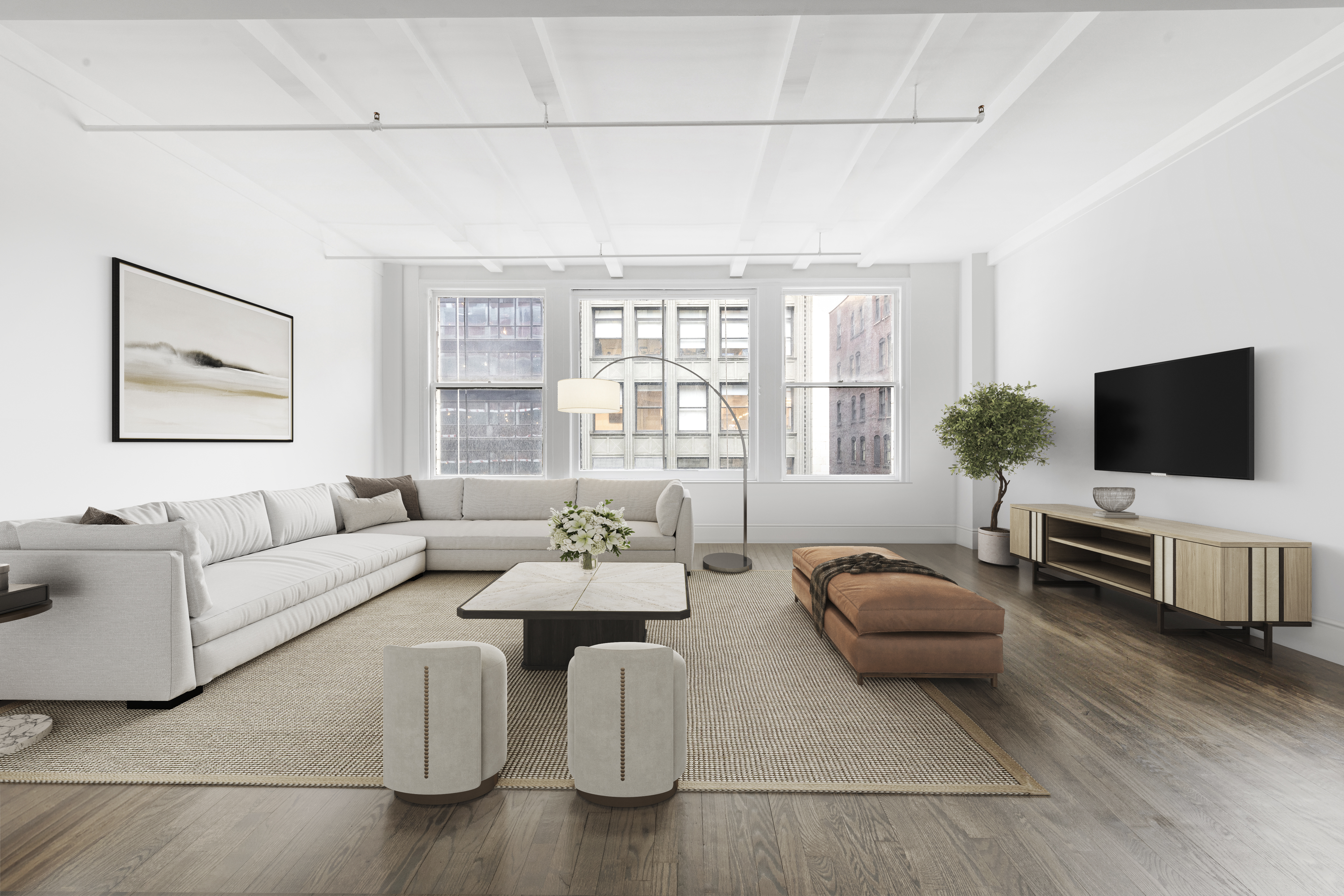 a living room with furniture and a flat screen tv