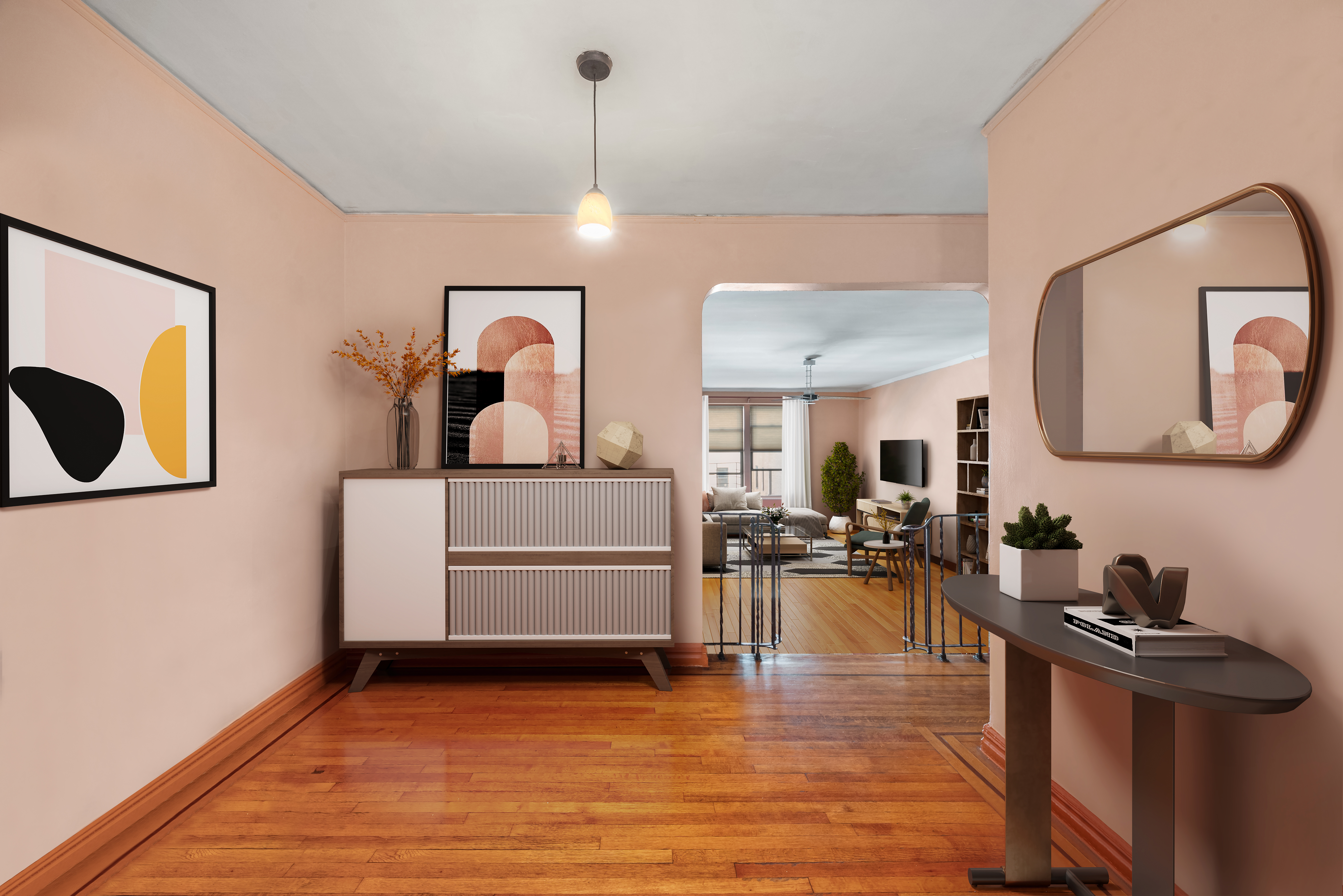 a living room with furniture and a wooden floor