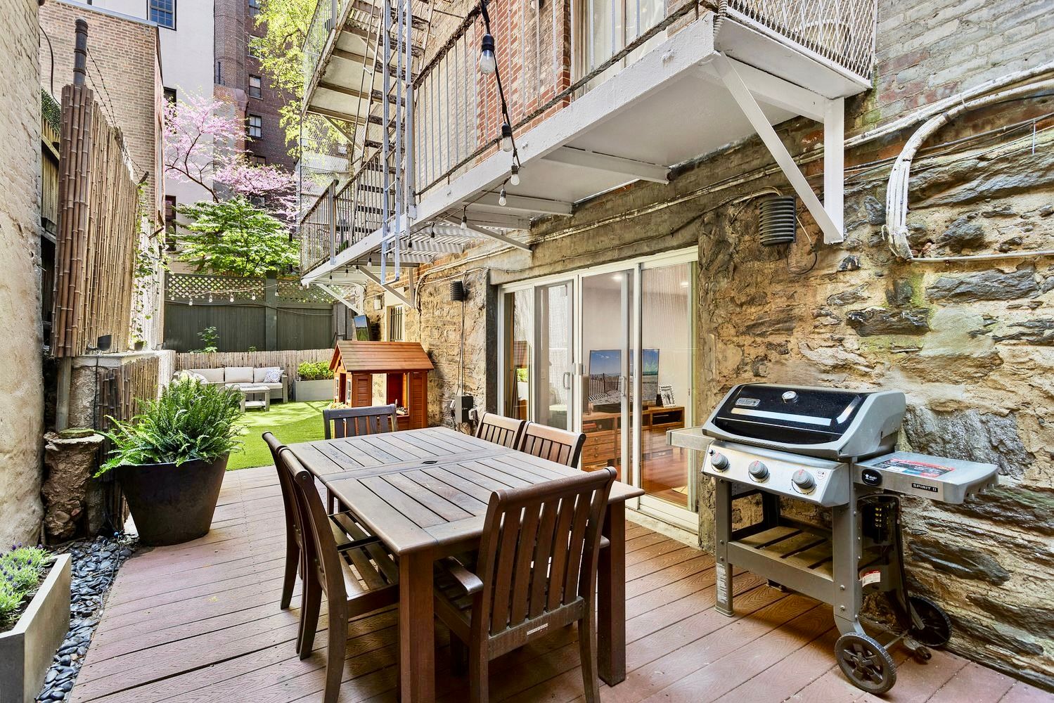 a view of a dinning table and chairs in terrace