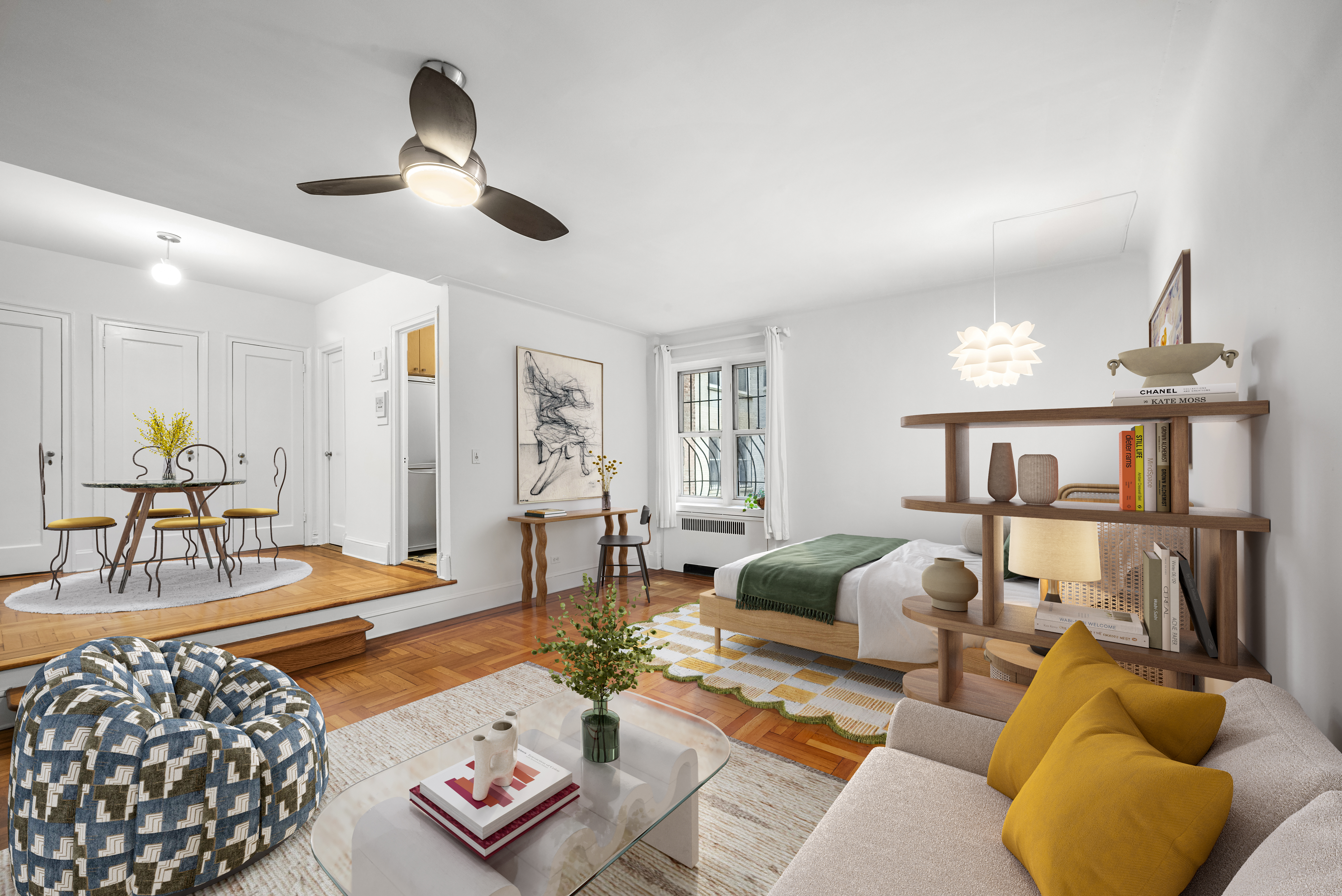 a living room with furniture and wooden floor