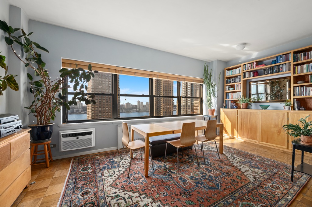 a living room with furniture and a window