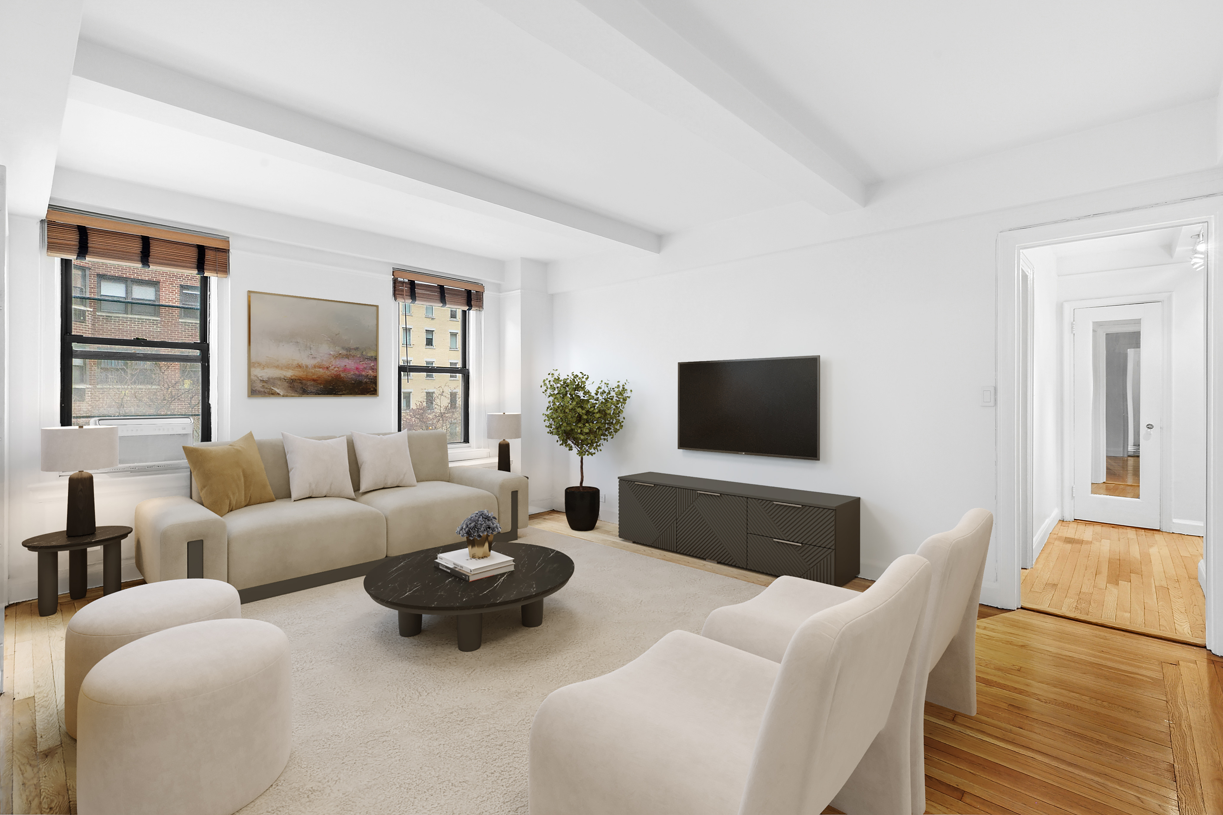 a living room with furniture and a flat screen tv