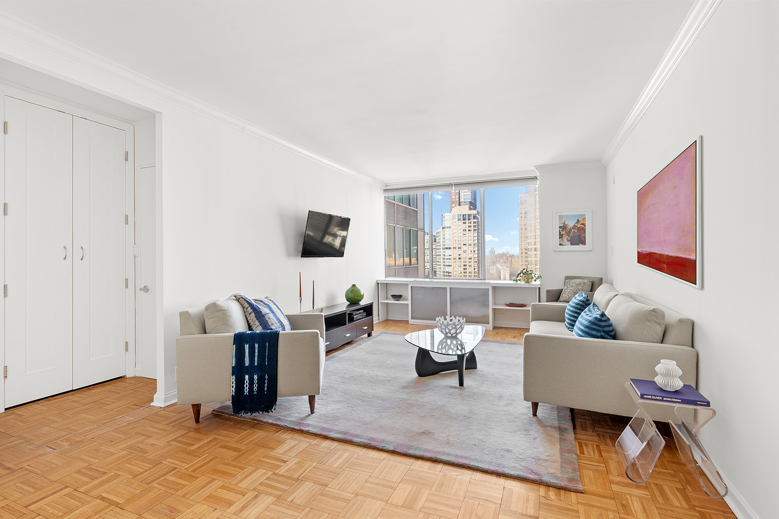 a living room with furniture and a window