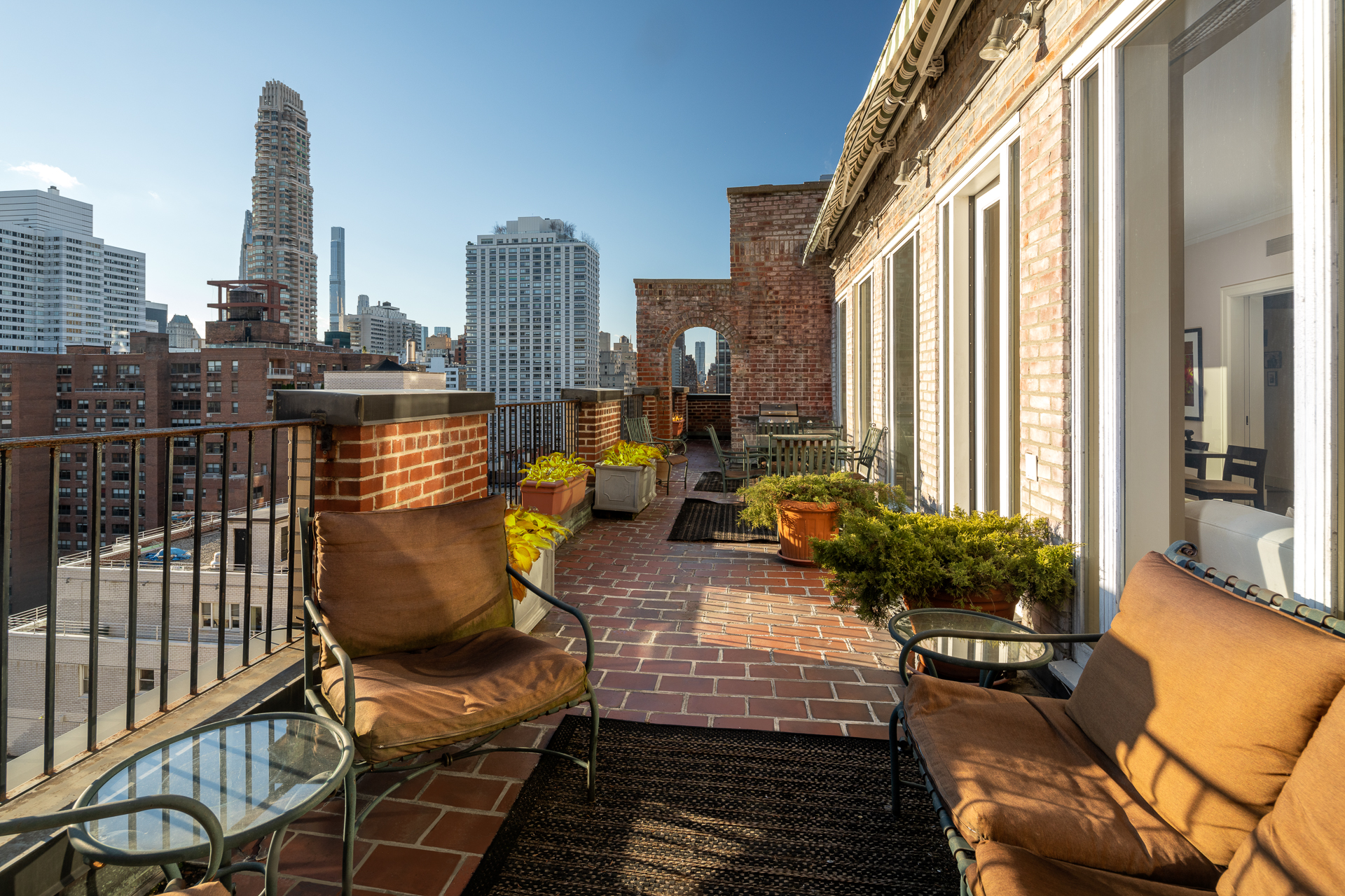 a view of a balcony with chairs