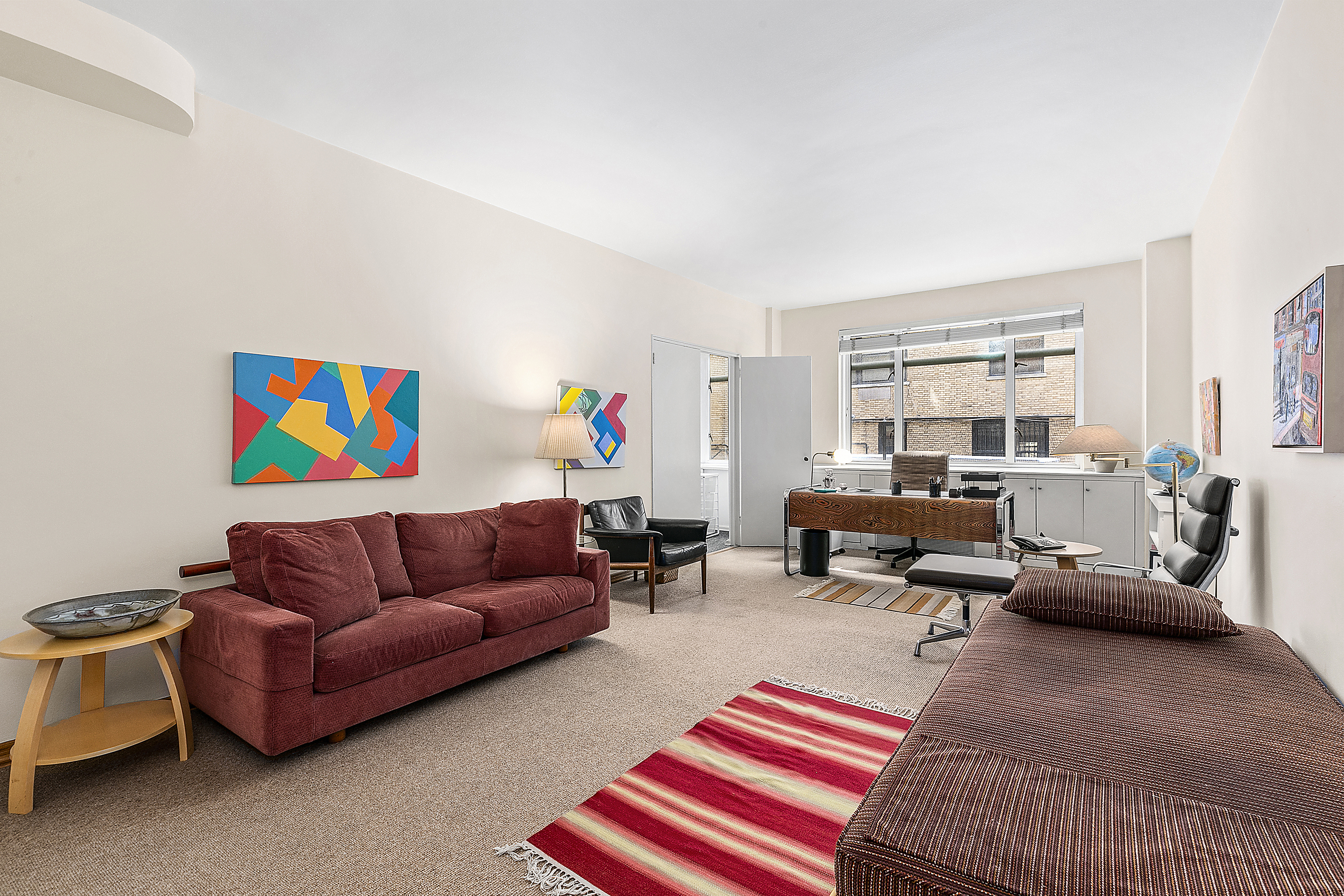 a living room with furniture and a couch