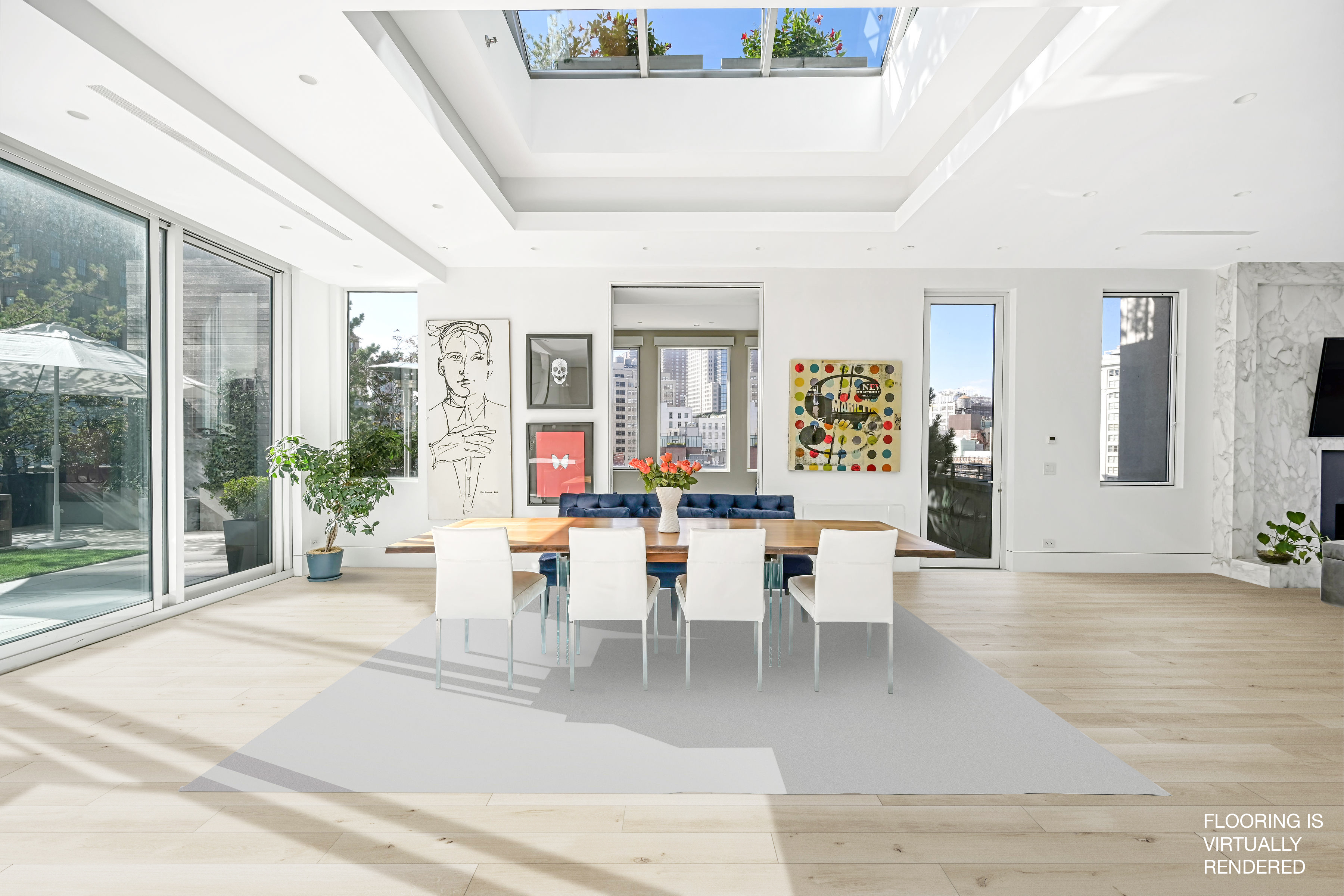 a dining room with wooden floor and large windows