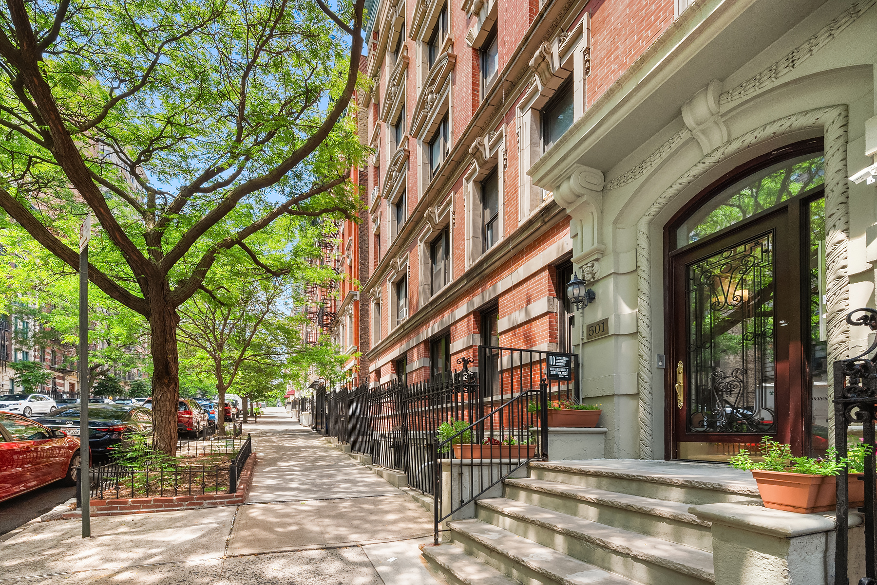 a view of a building with a bench in a patio