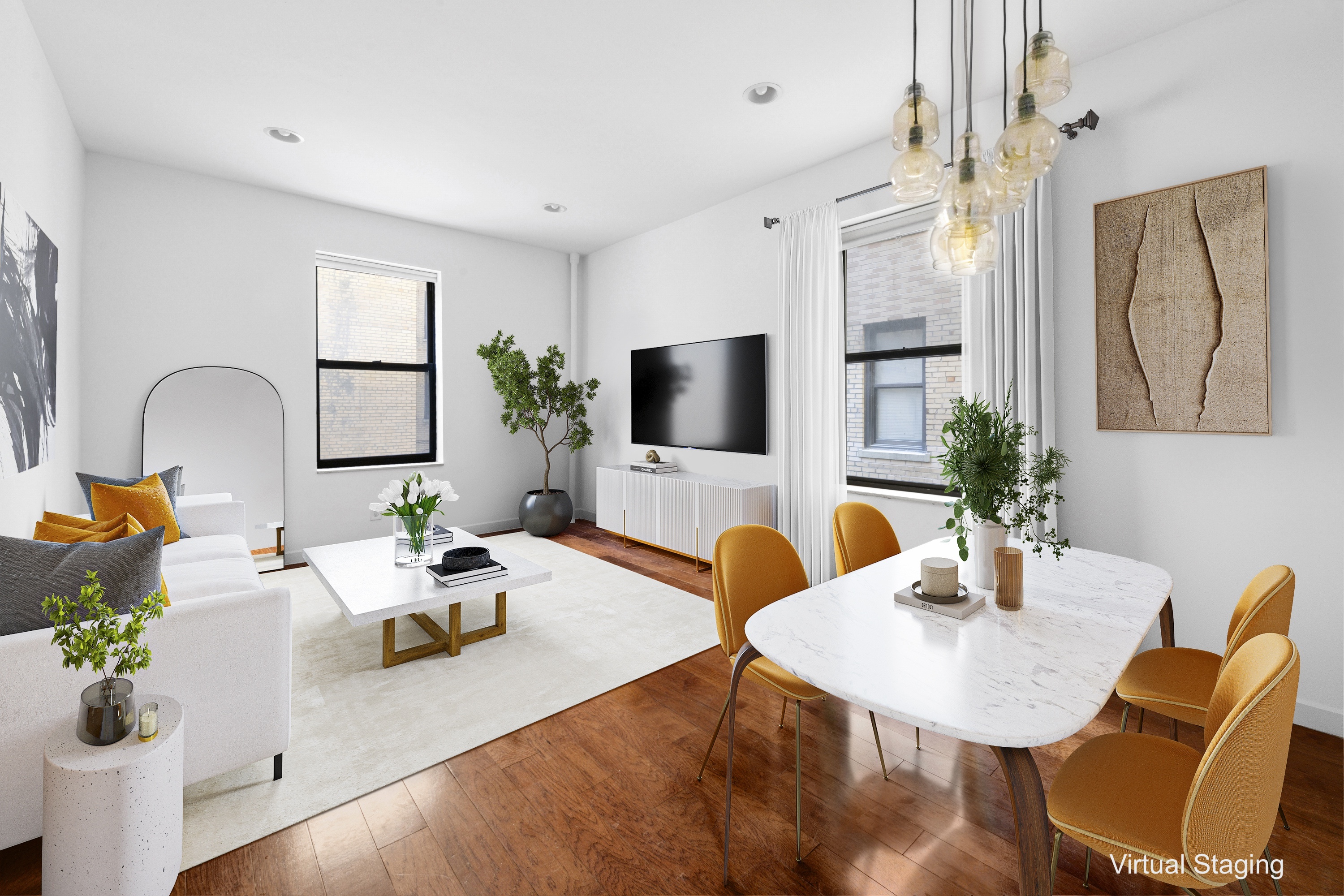 a dining room with furniture and wooden floor