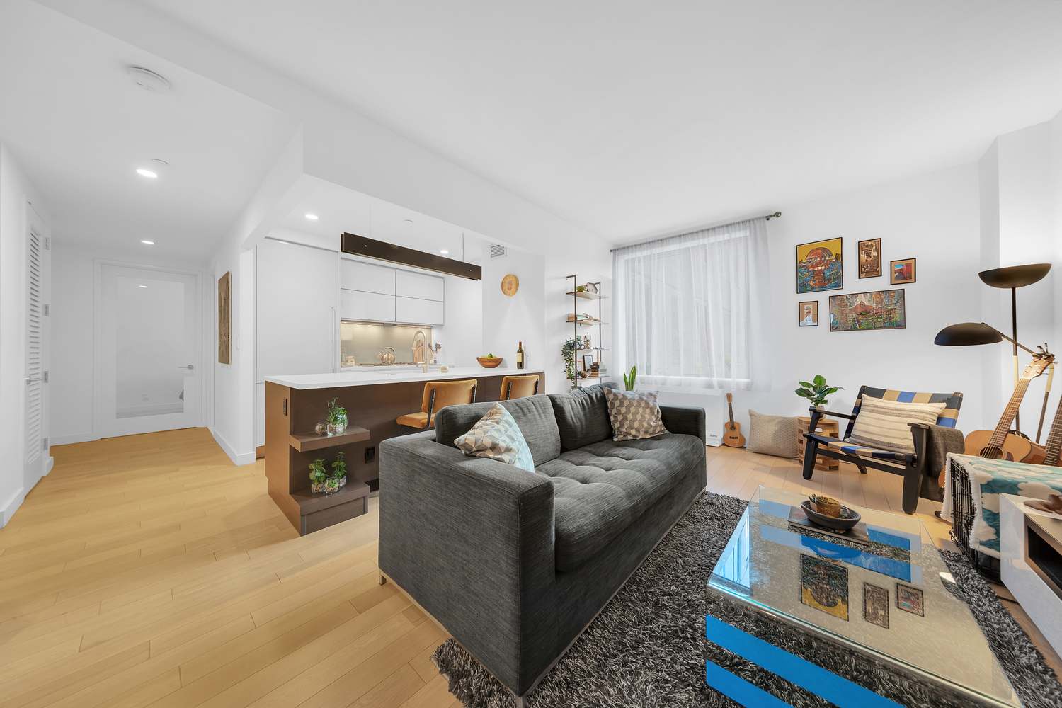 a living room with furniture and a table