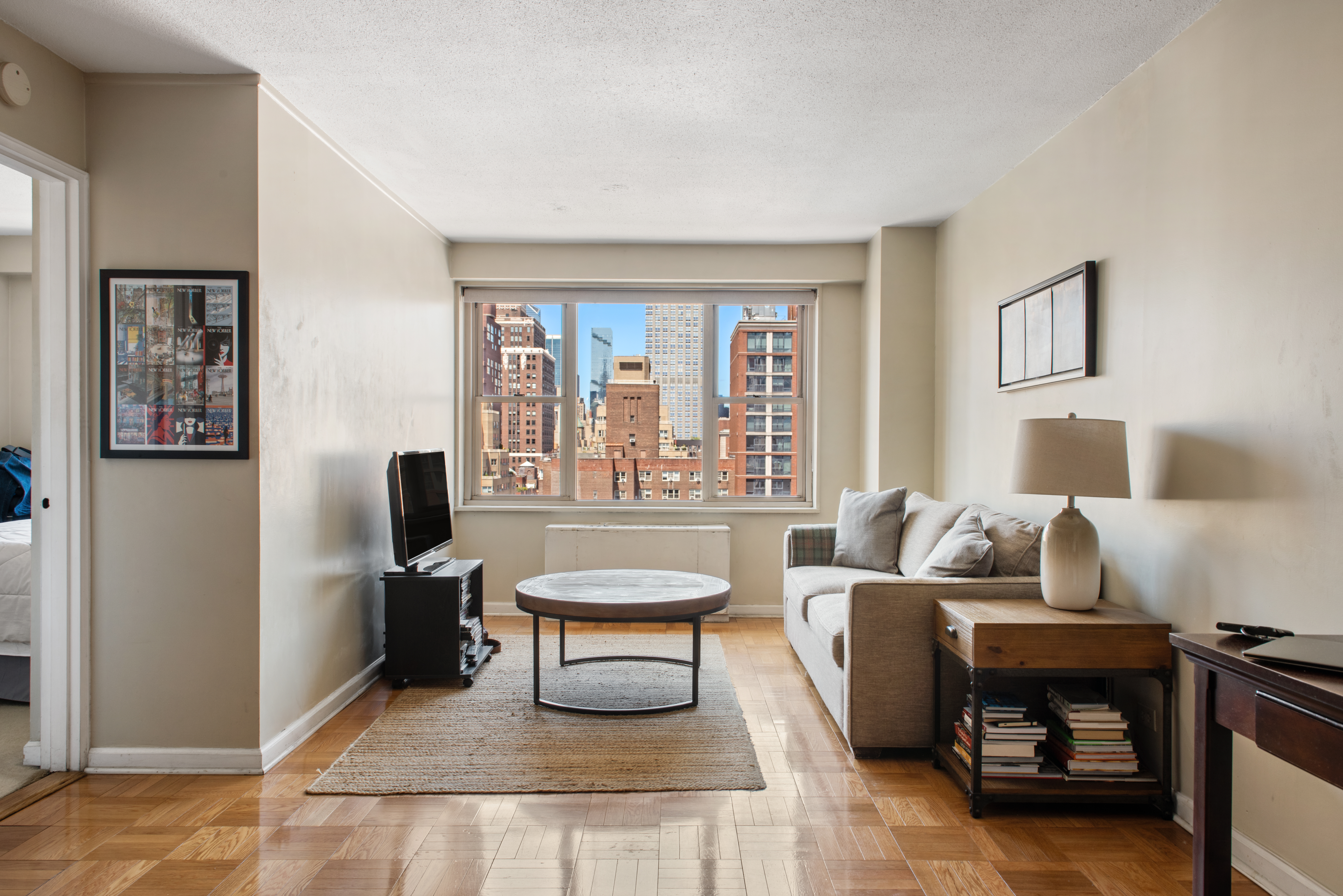 a living room with furniture and a window