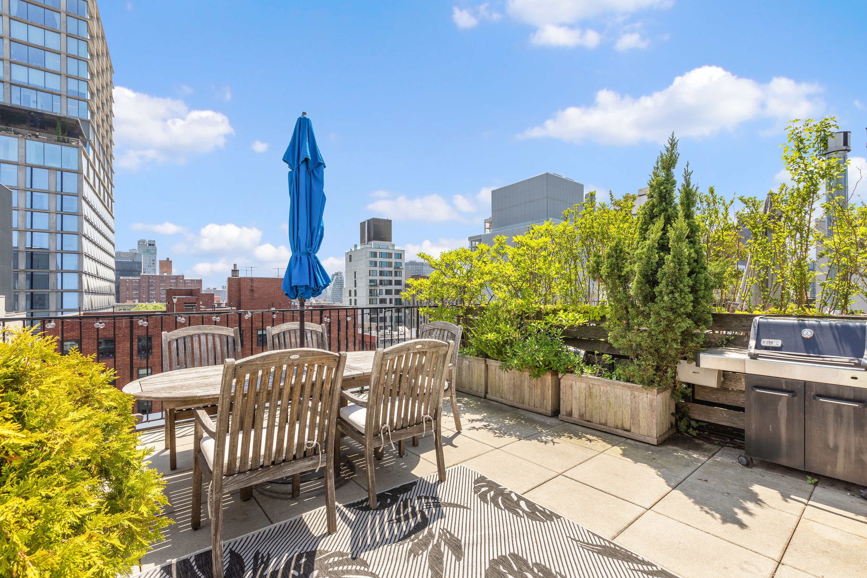 a view of a terrace with sitting area