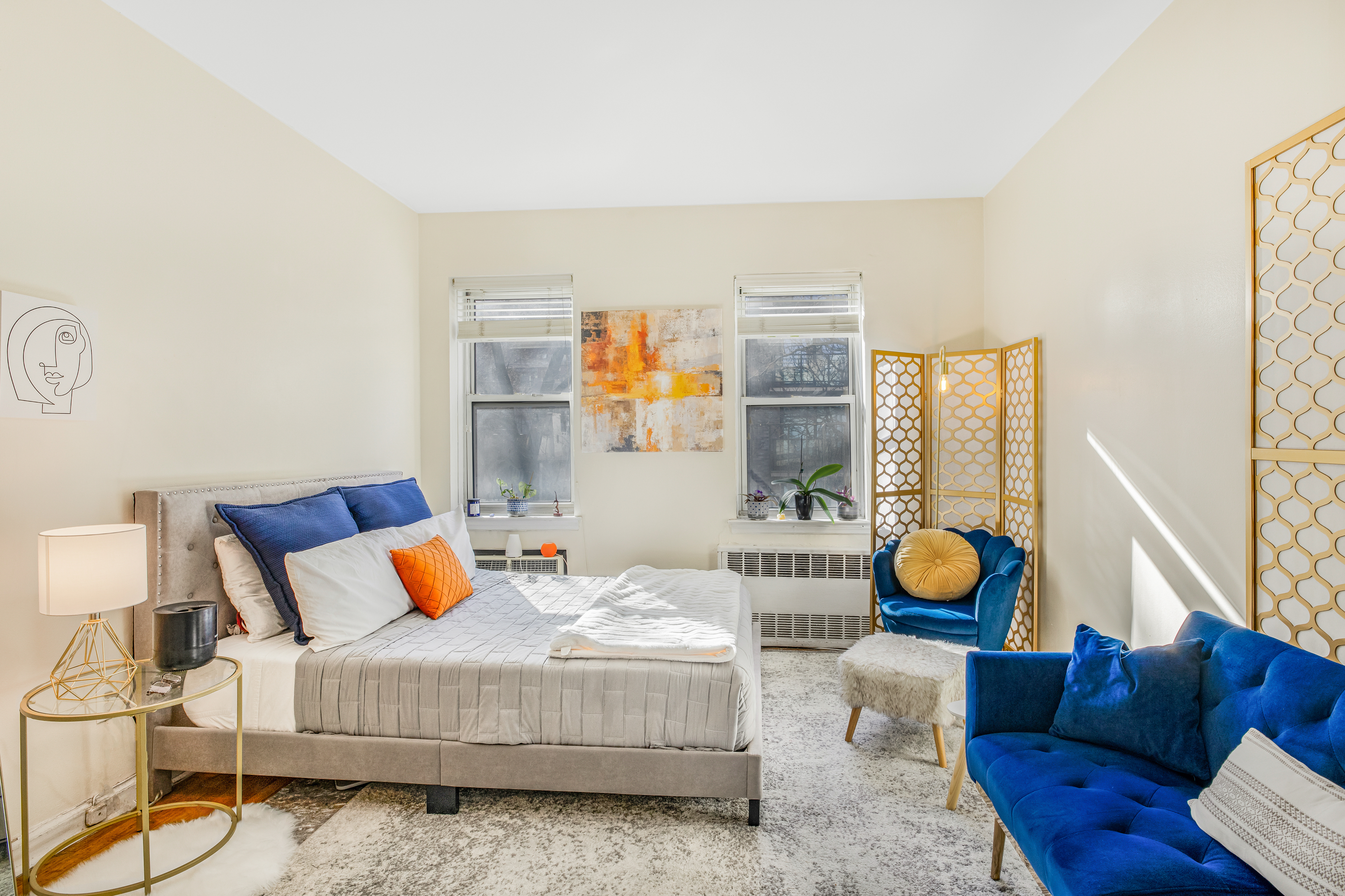 a bedroom with furniture and a couch