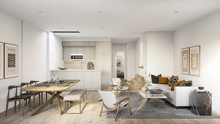 a living room with dining room and wooden floor