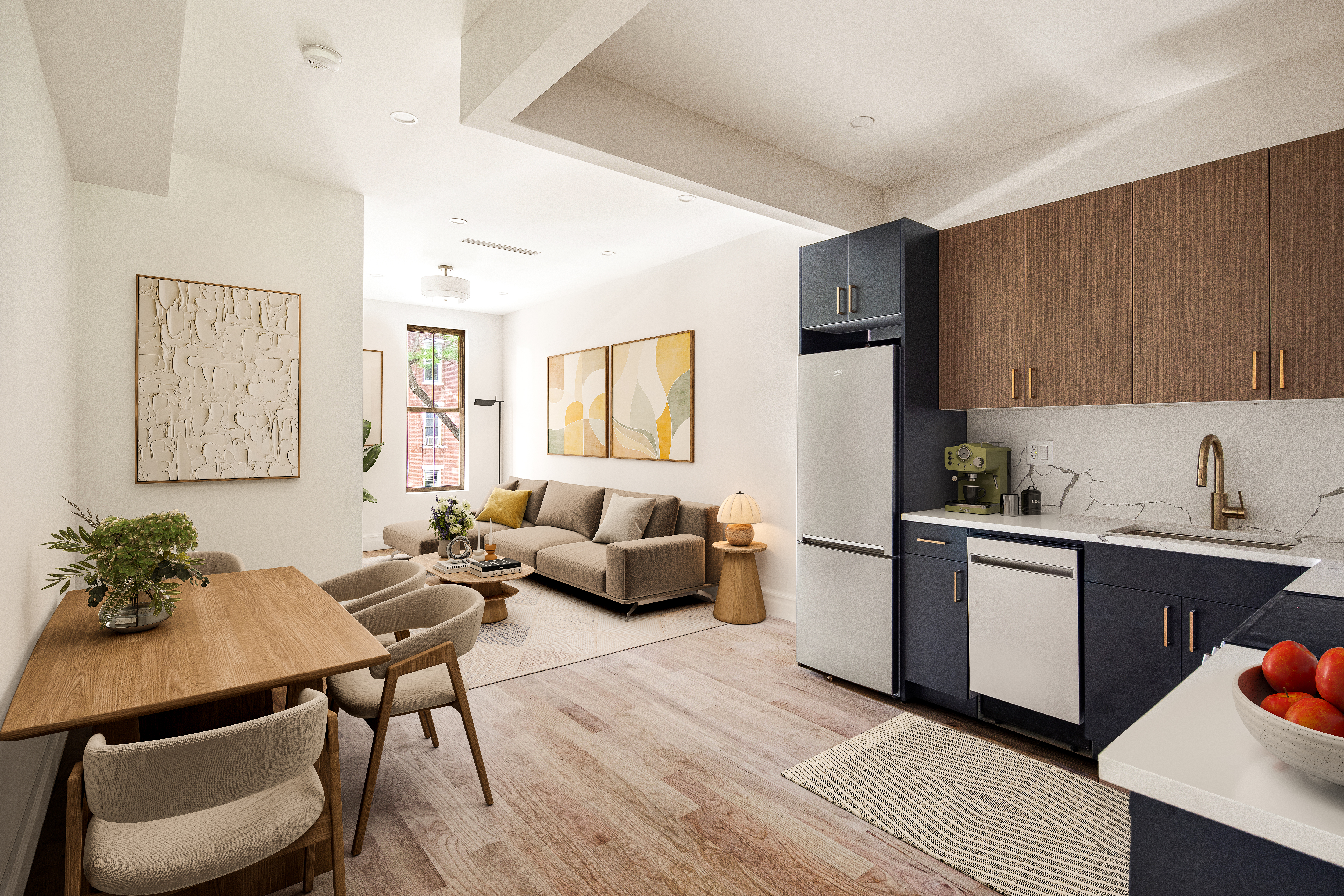 a living room with stainless steel appliances kitchen island granite countertop furniture and a kitchen view