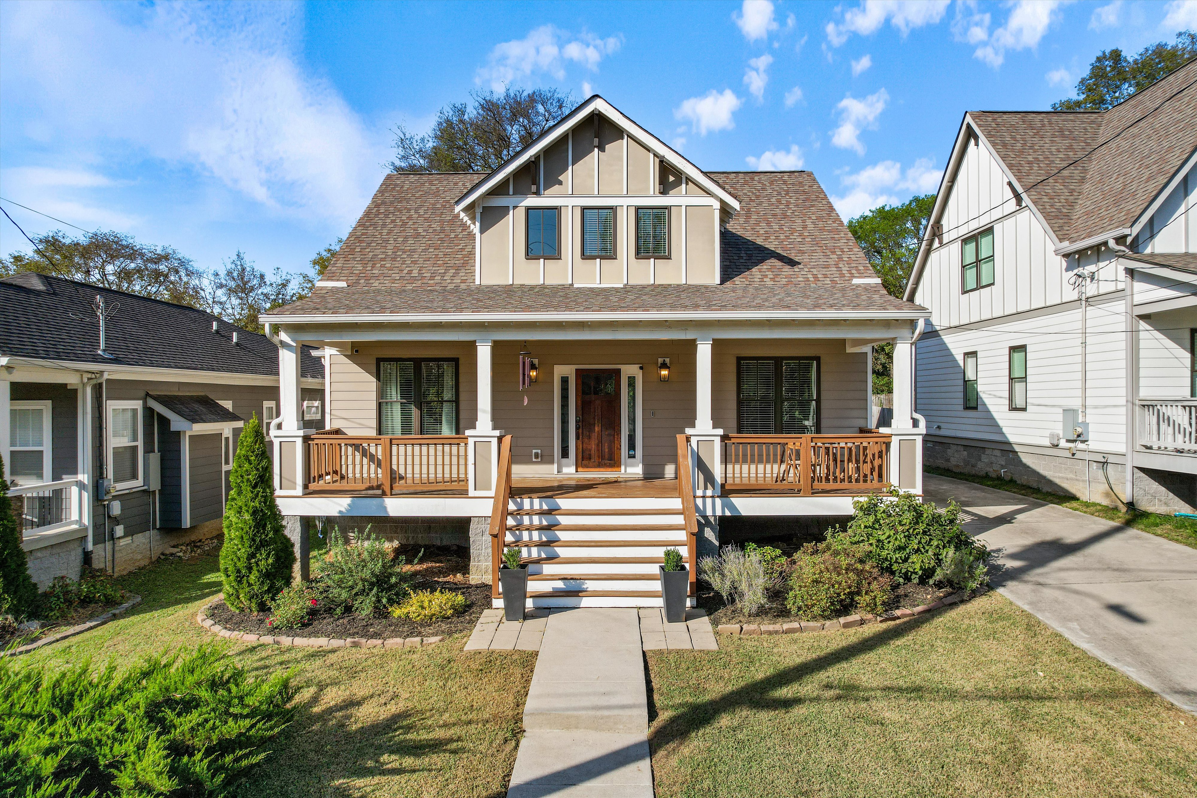 a front view of a house with garden