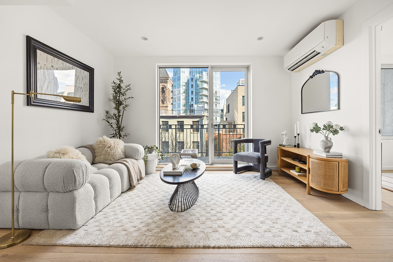 a living room with furniture rug and window