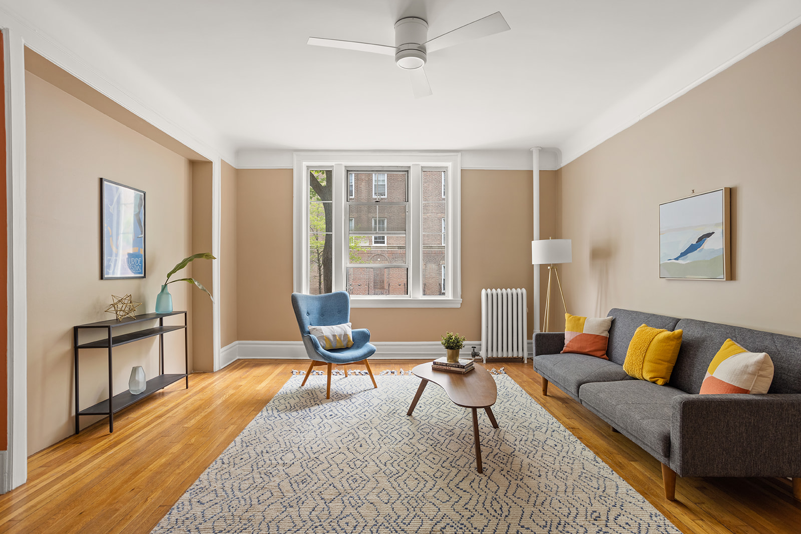 a living room with furniture and a window