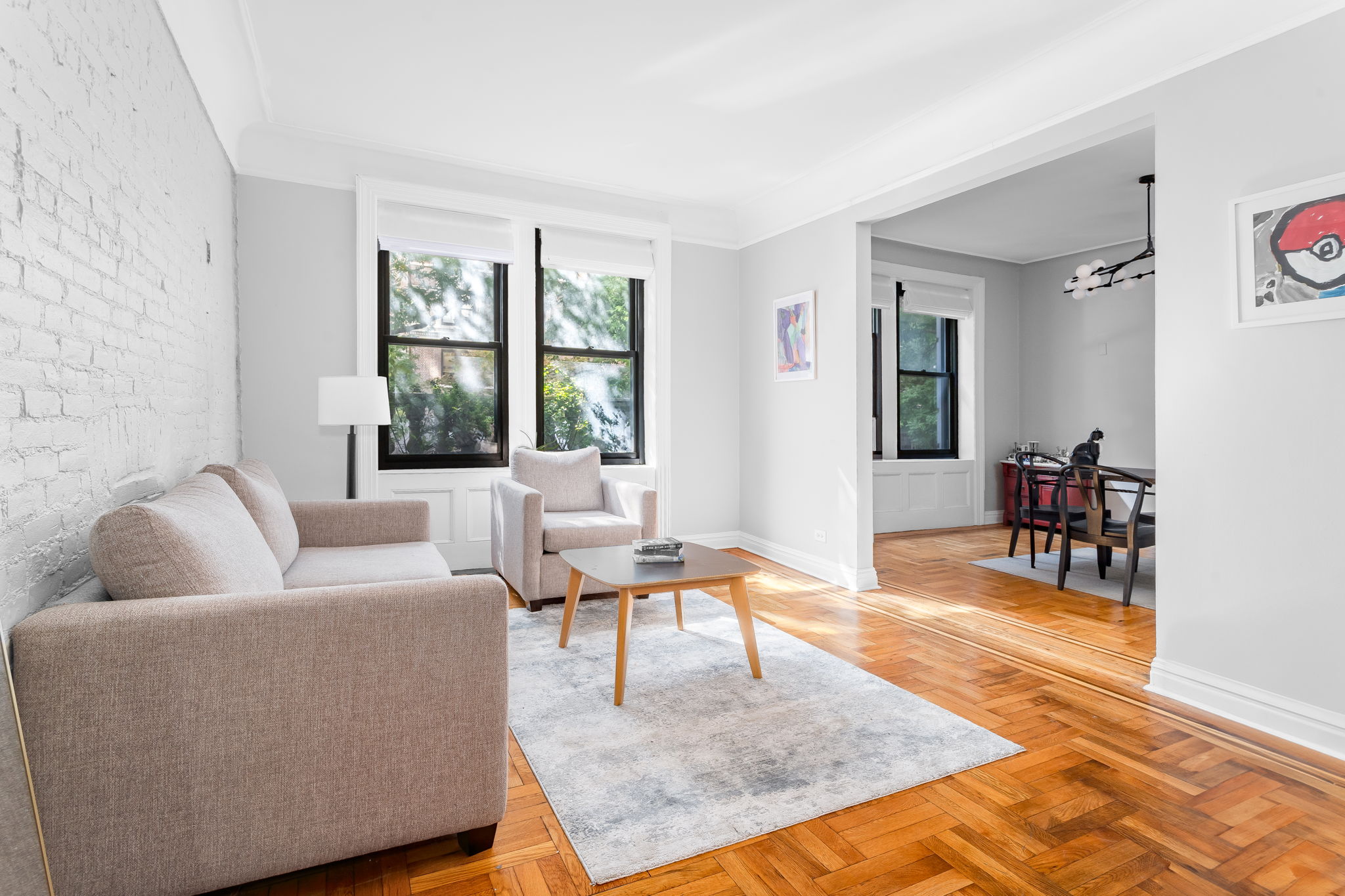 a living room with furniture and a rug