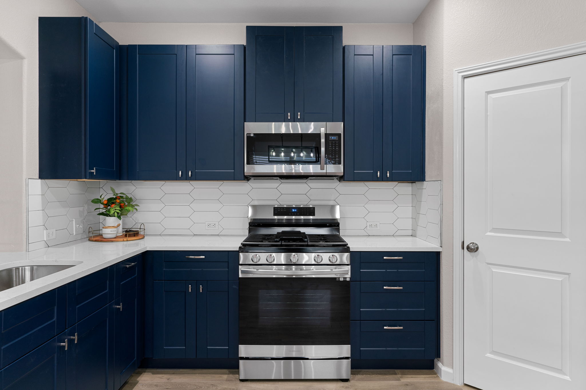 a kitchen with a sink and a cabinets