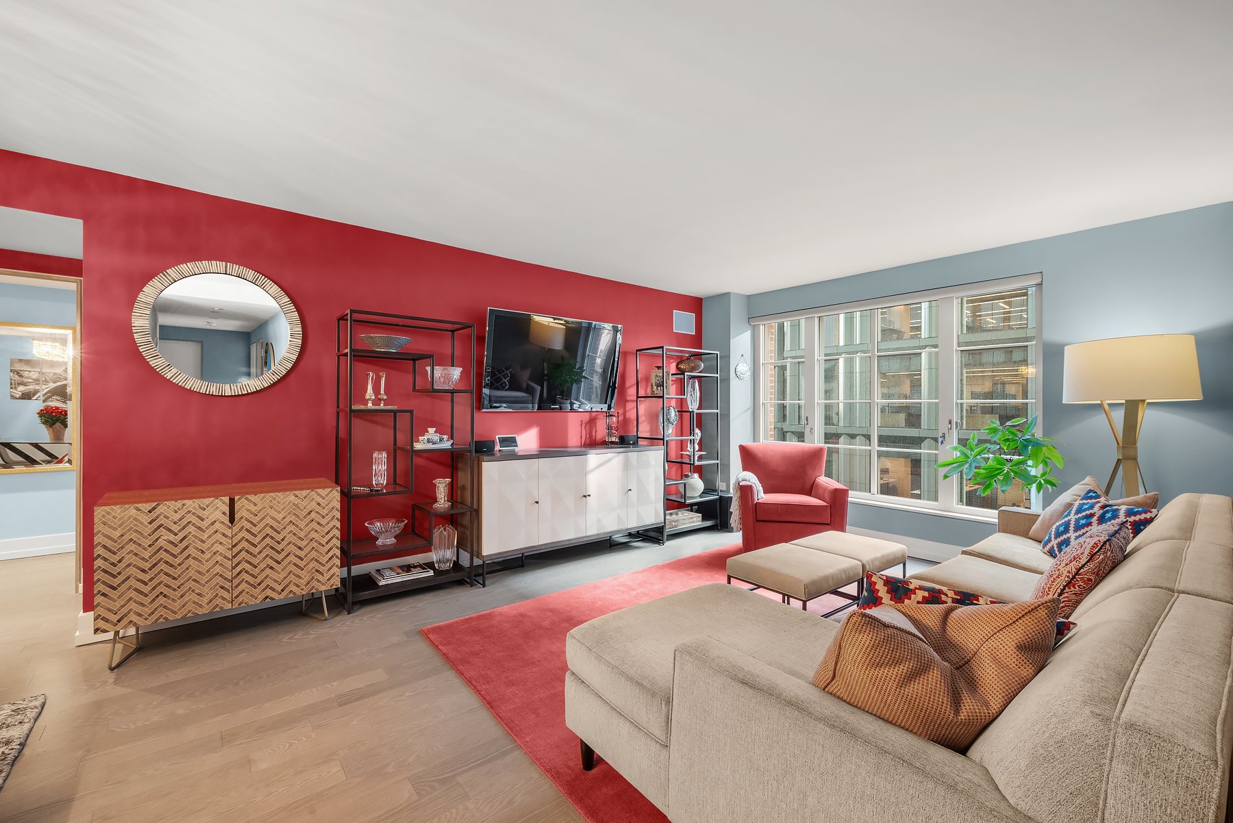 a living room with furniture and a flat screen tv