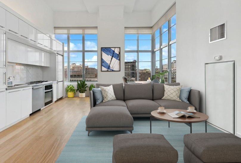 a living room with furniture and a table