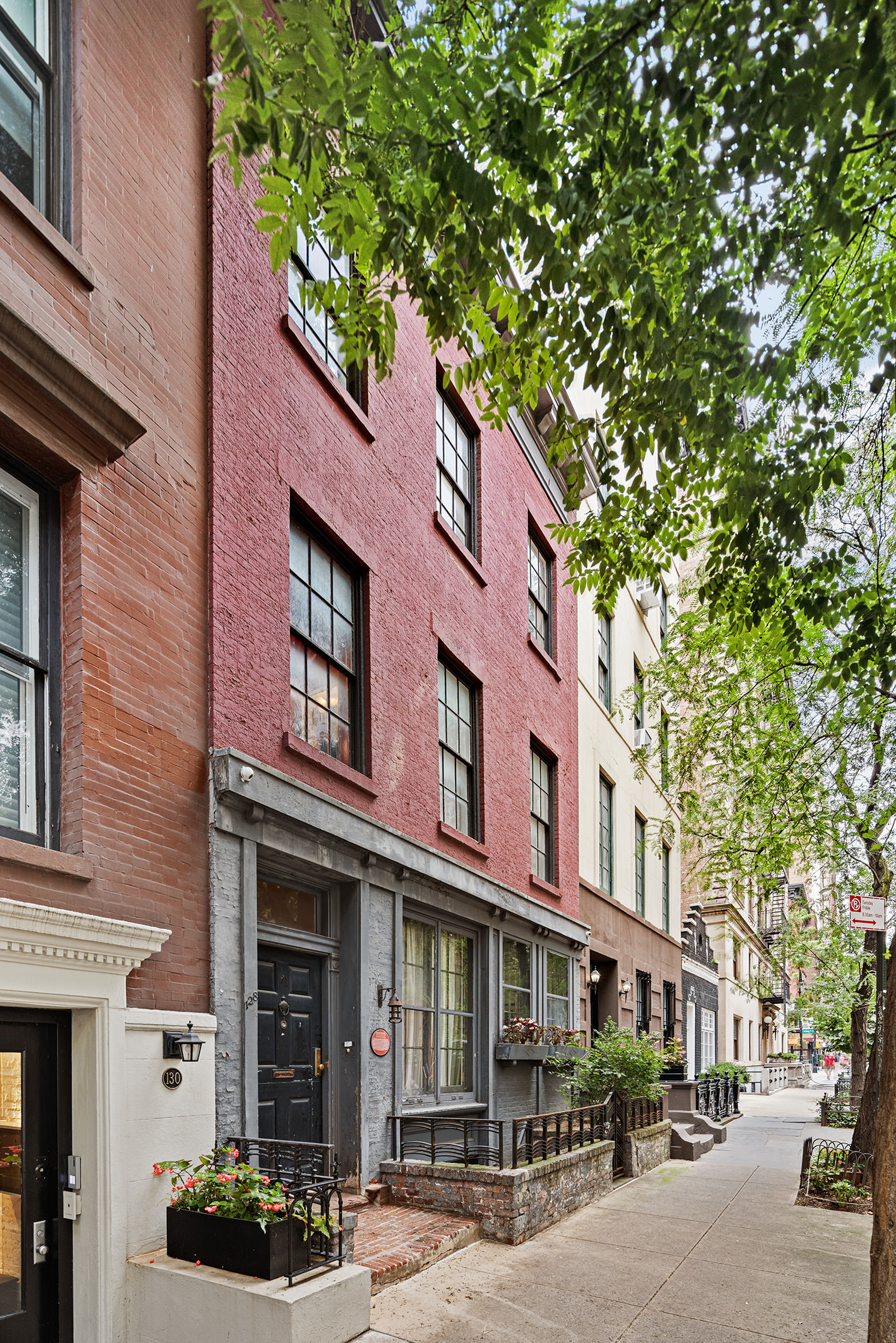 a front view of a building with street view