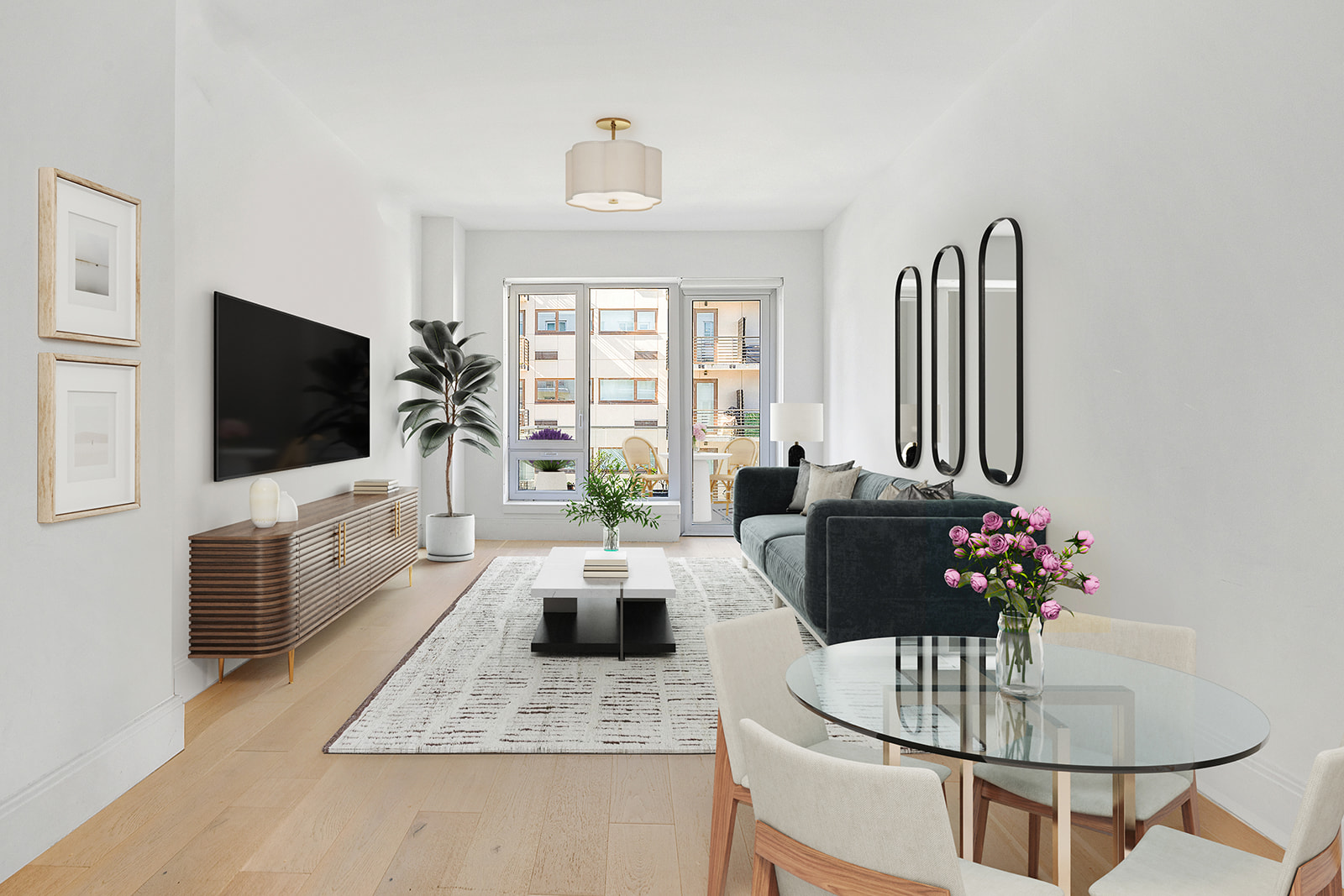 a living room with furniture and a flat screen tv