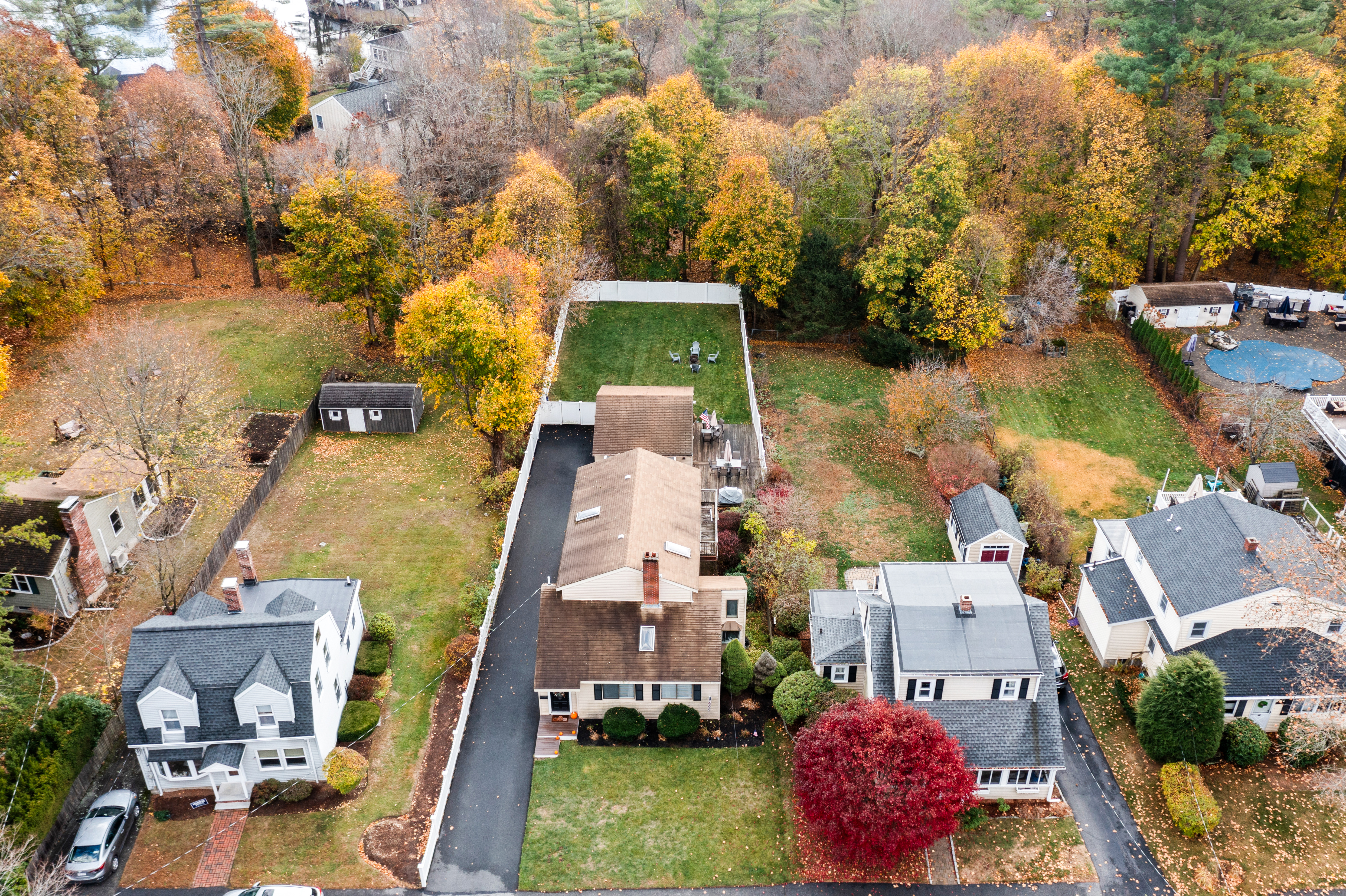 an aerial view of a house with a swimming pool