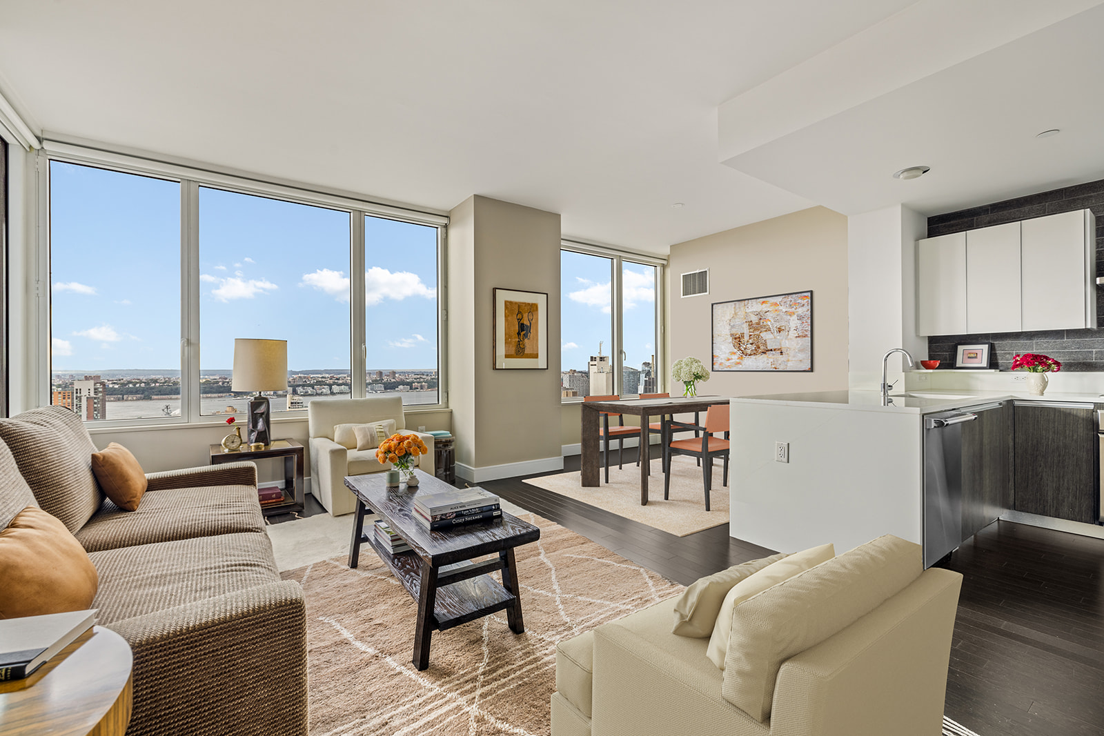 a living room with furniture and a table