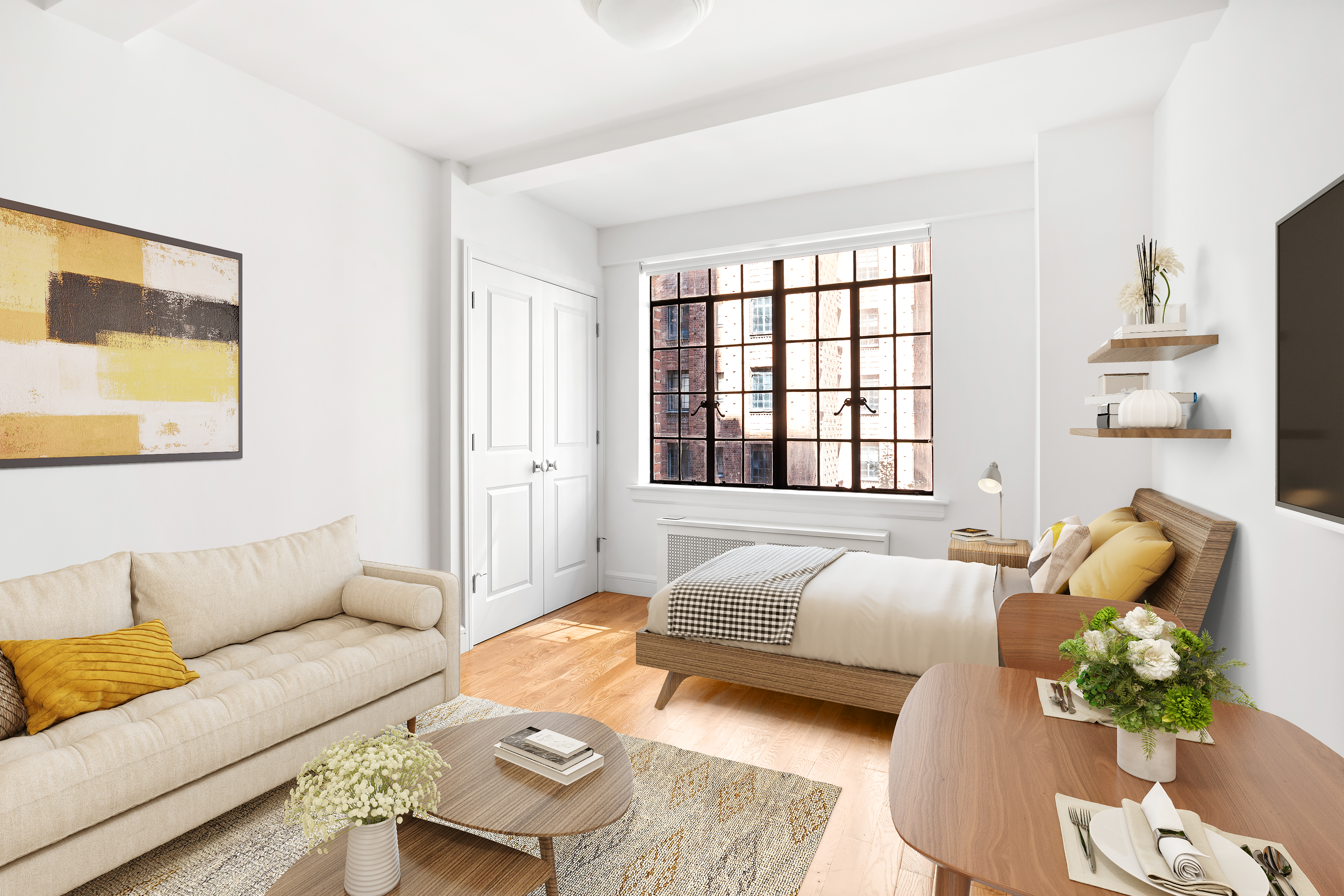 a bedroom with a bed couch and window