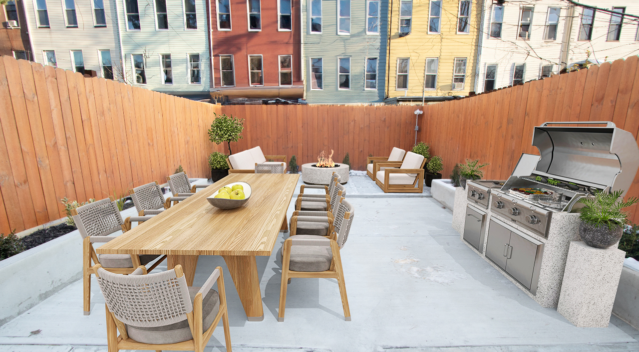 a view of a patio with table and chairs