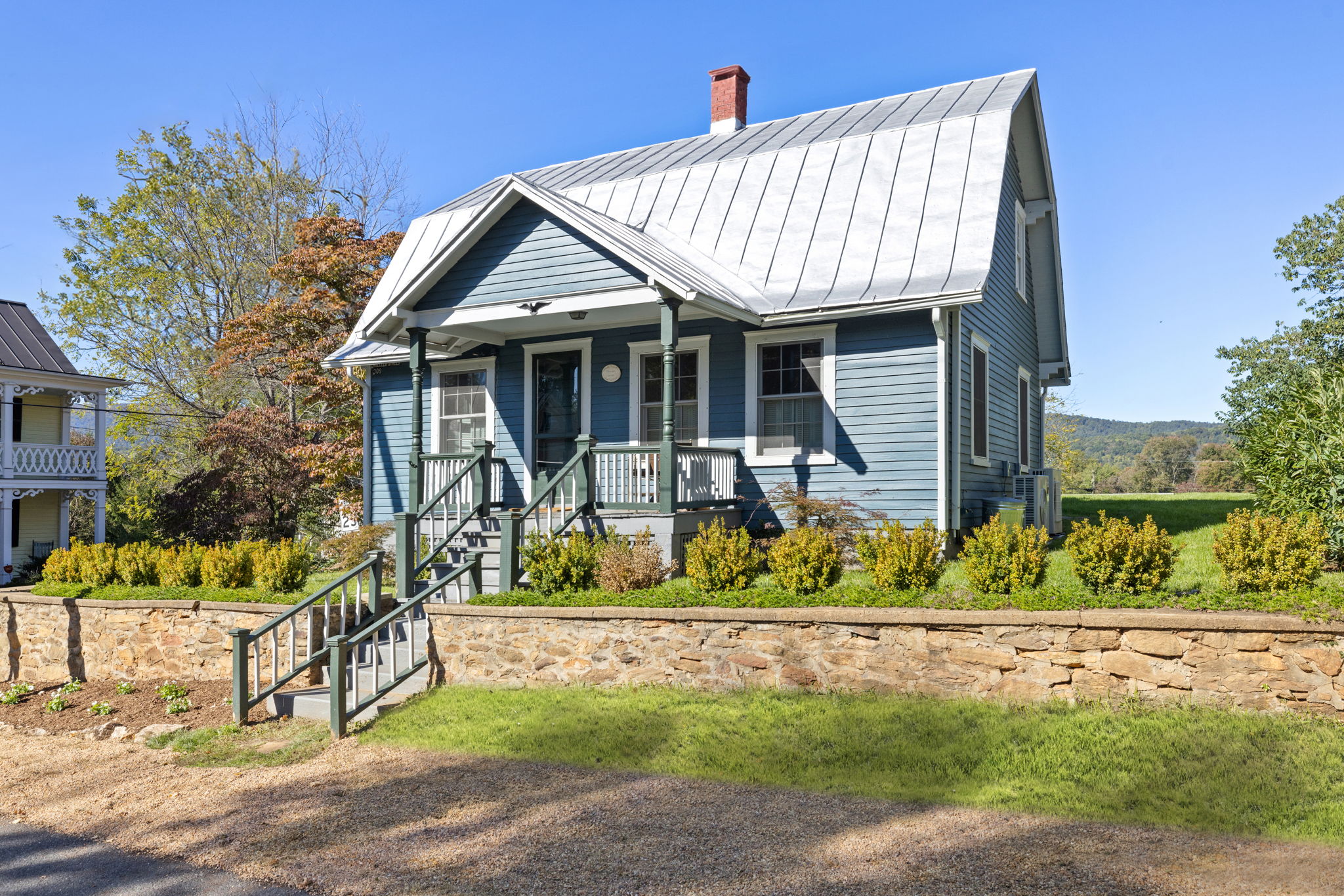 a front view of a house with a porch