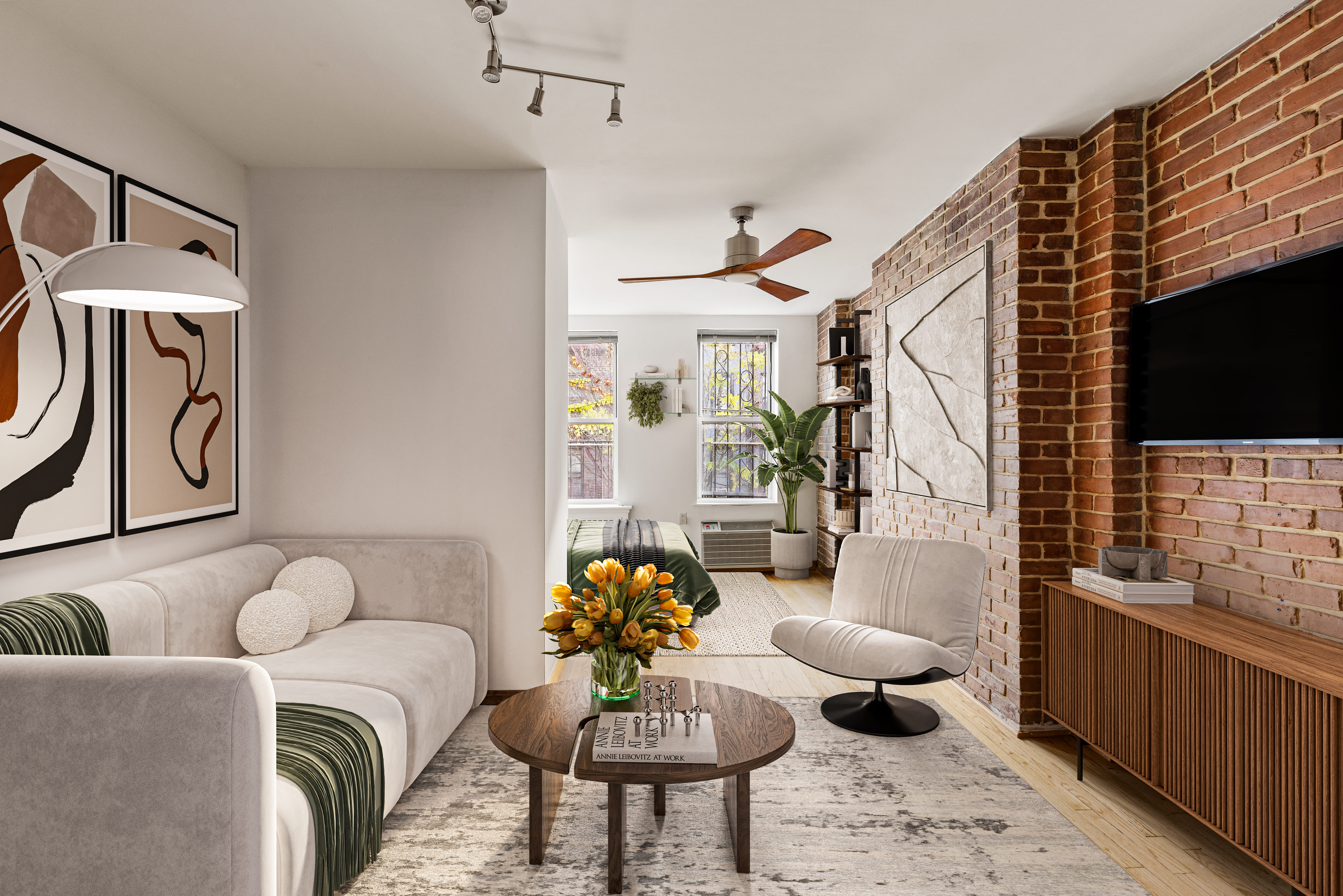 a living room with furniture and a flat screen tv