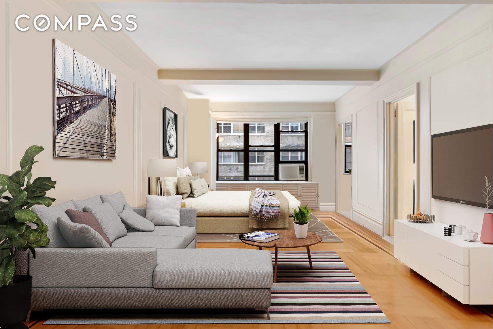 a living room with furniture and a flat screen tv