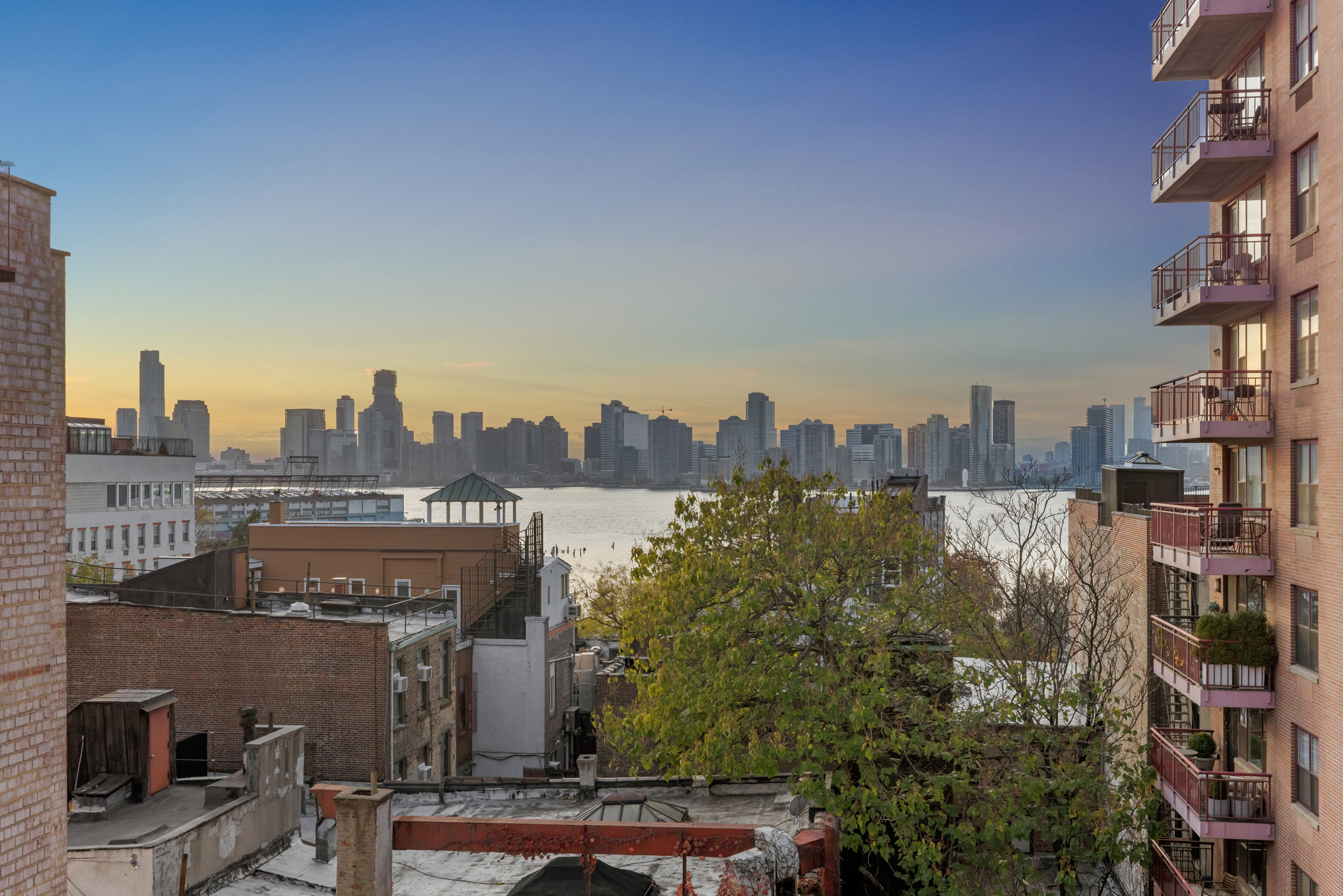 a view of a city with tall buildings