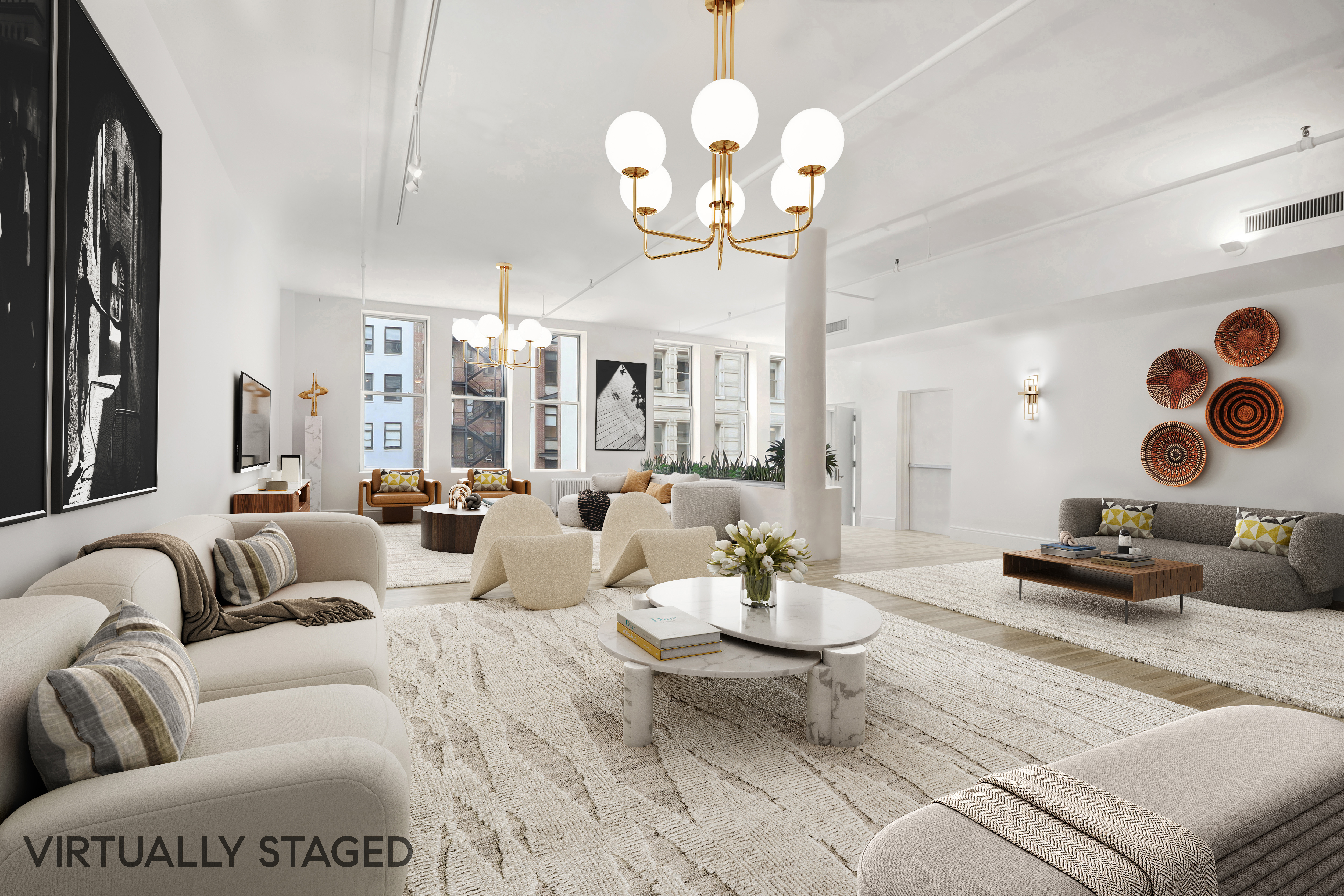 a living room with lots of furniture and view of kitchen