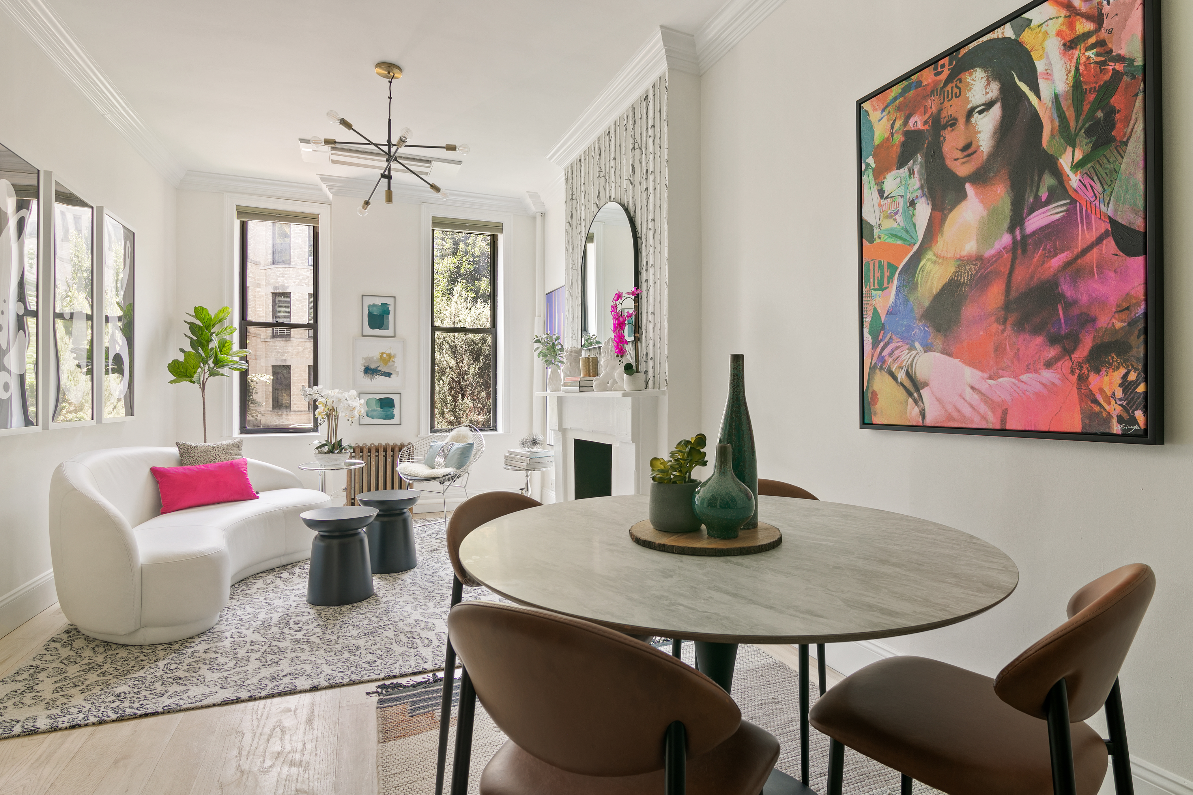 a dining room with furniture and window