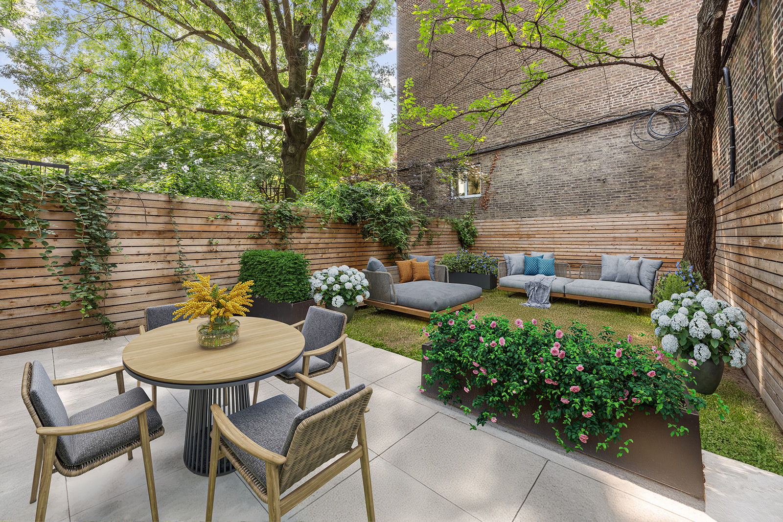 a backyard of a house with outdoor seating