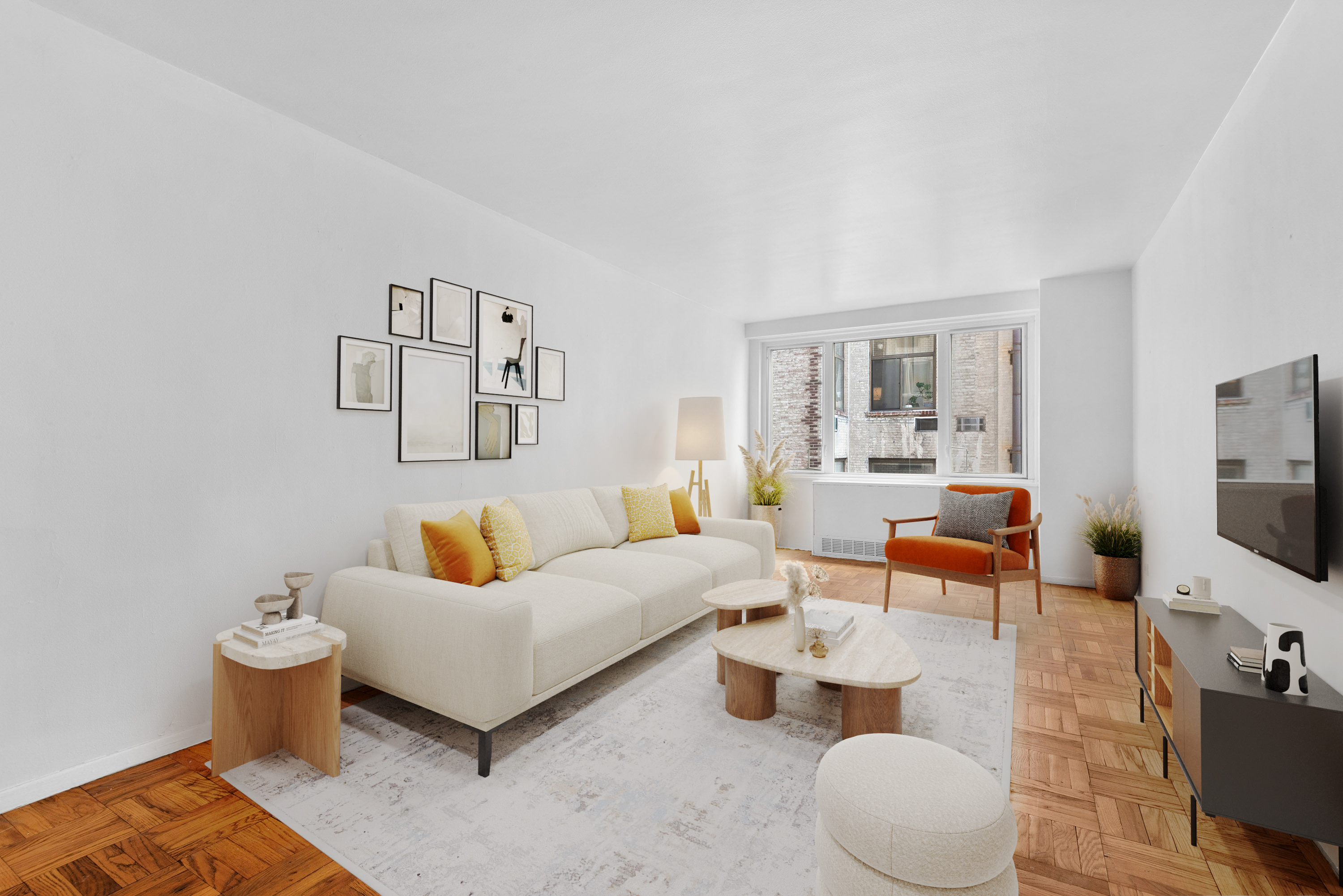 a living room with furniture and a flat screen tv