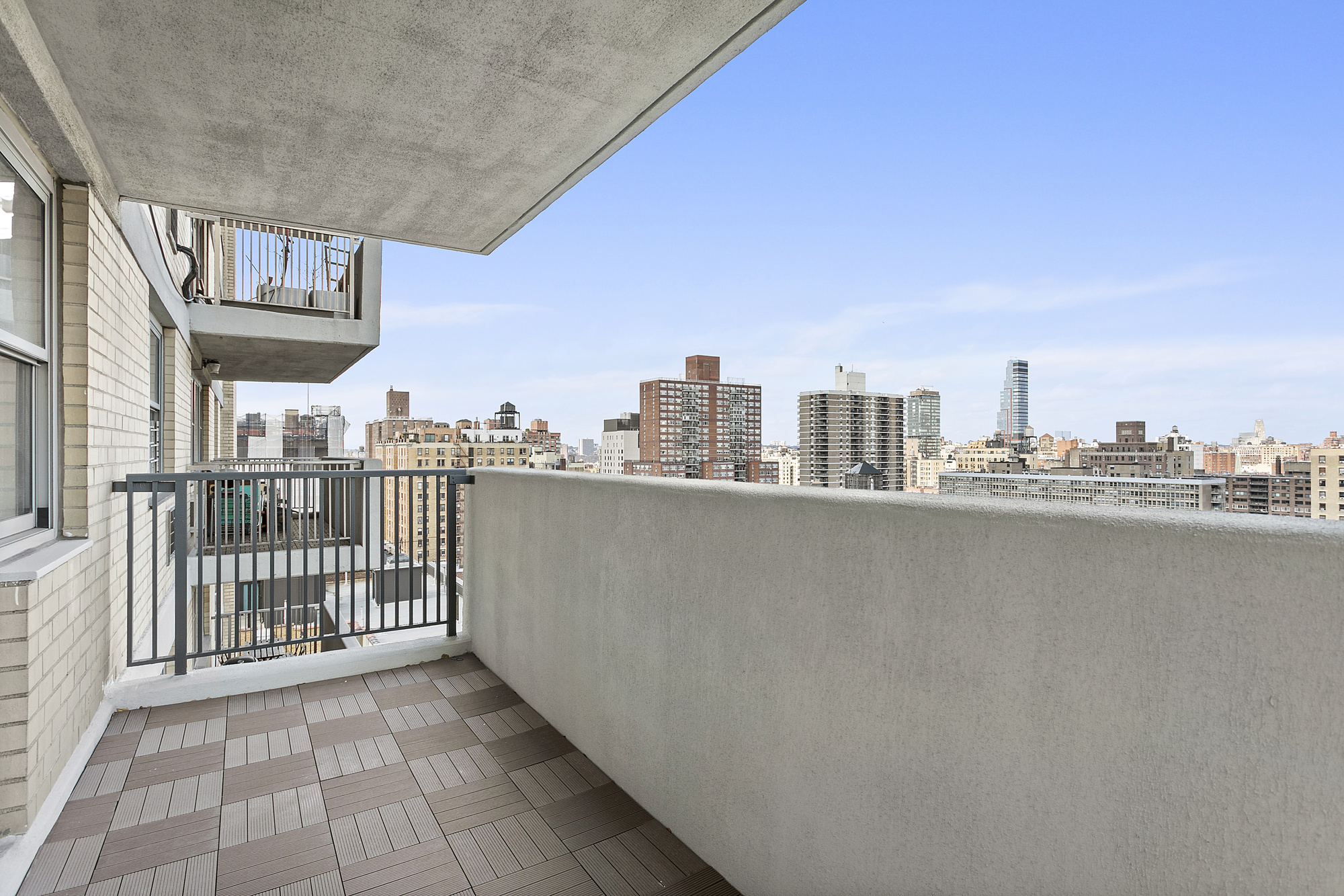 a view of a balcony with city view