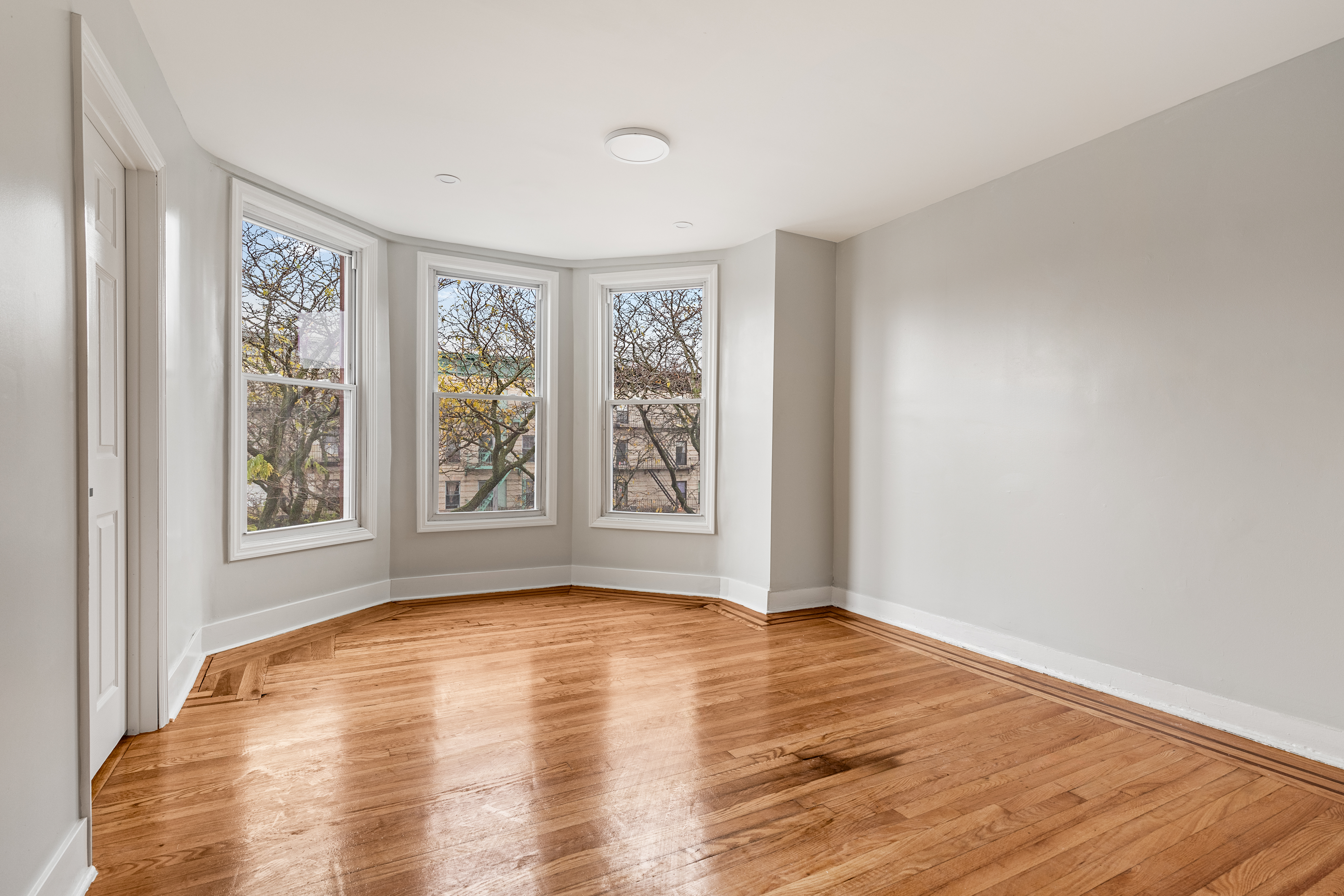 a view of an empty room with window